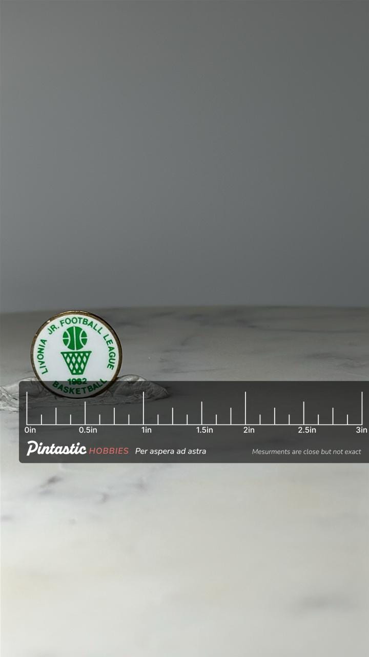 Vintage Livonia Jr Football League Basketball Pin: Green Enamel - 1982 Sports Accessory with ruler overlay for size reference