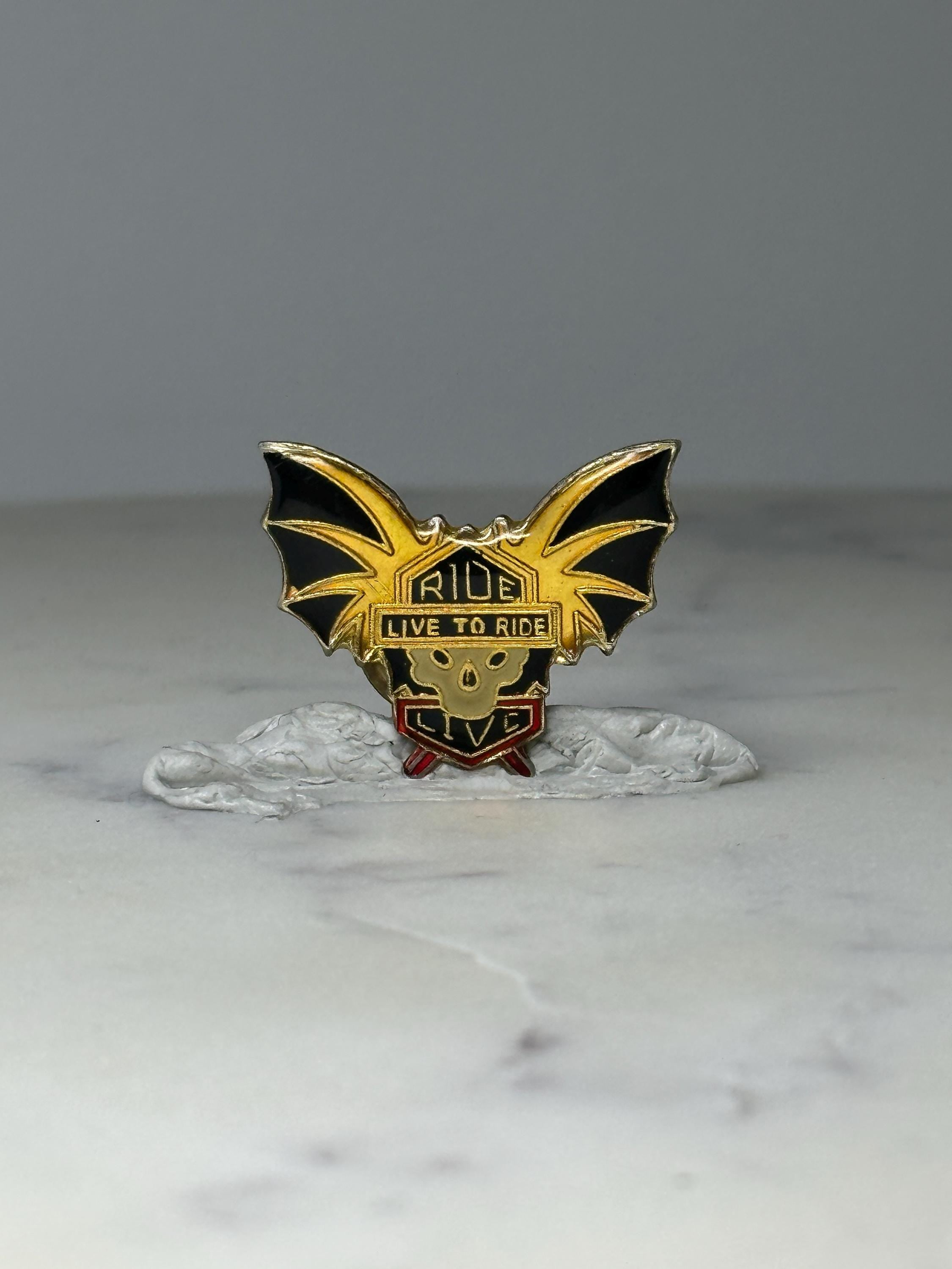 Vintage Biker Skull Enamel Pin: Gold & Black - Ride Theme Accessory