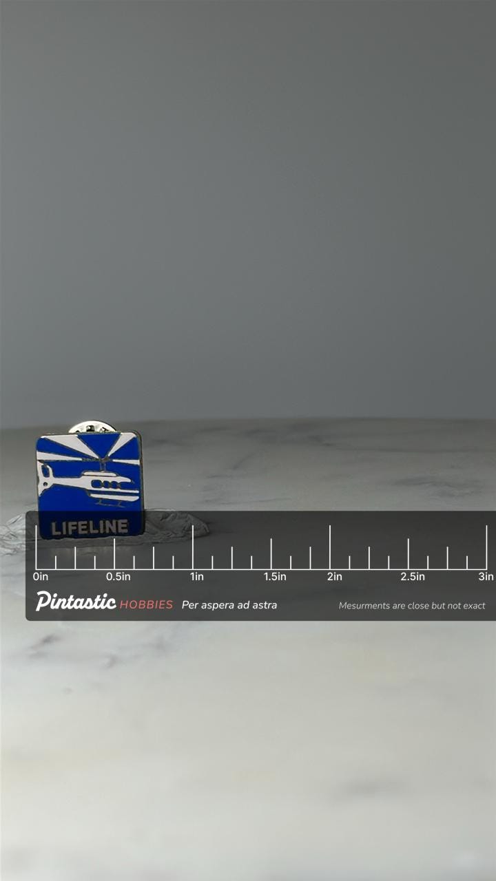 Vintage Lifeline Helicopter Enamel Pin: Blue Silver - Aviation Accessory with ruler overlay for size reference