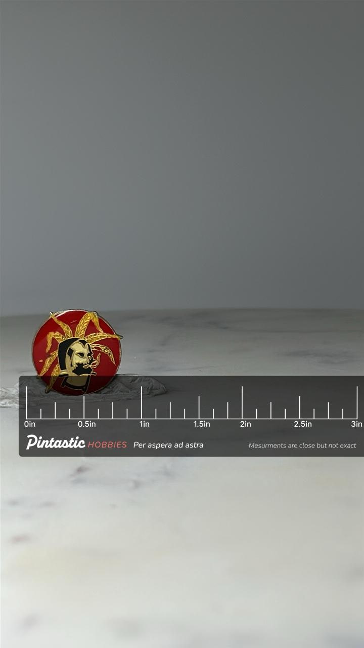 Vintage Zig-Zag Captain Pin Rolling Papers Logo with ruler overlay for size reference