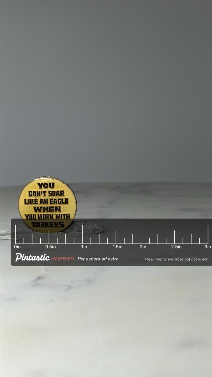 Vintage Eagle Humor Enamel Pin: Yellow & Black - Office Gag Accessory with ruler overlay for size reference