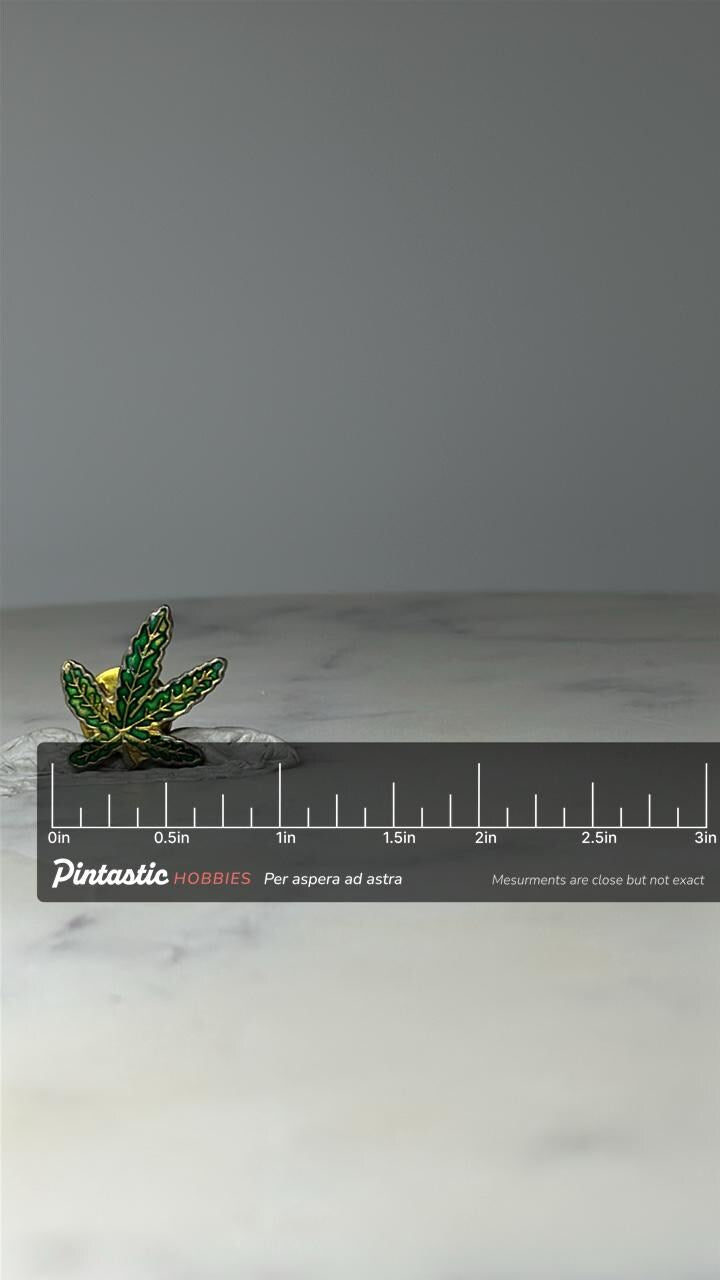 Vintage Marijuana Leaf Lapel Pin: Green Enamel Gold Tone - Retro Accessory with ruler overlay for size reference