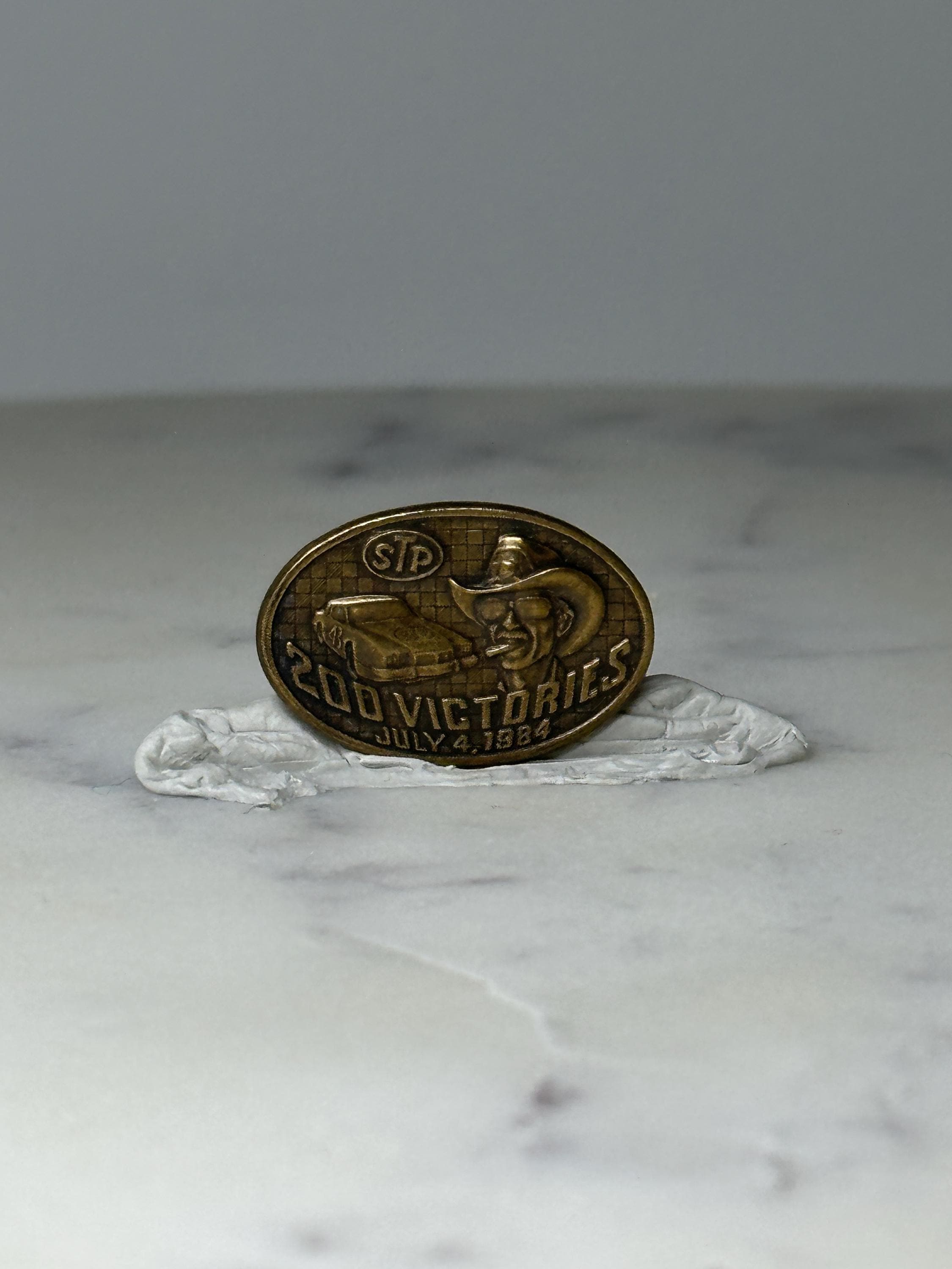 Vintage STP 200 Victories Racing Pin: Gold Tone - 1984 Motorsport Accessory