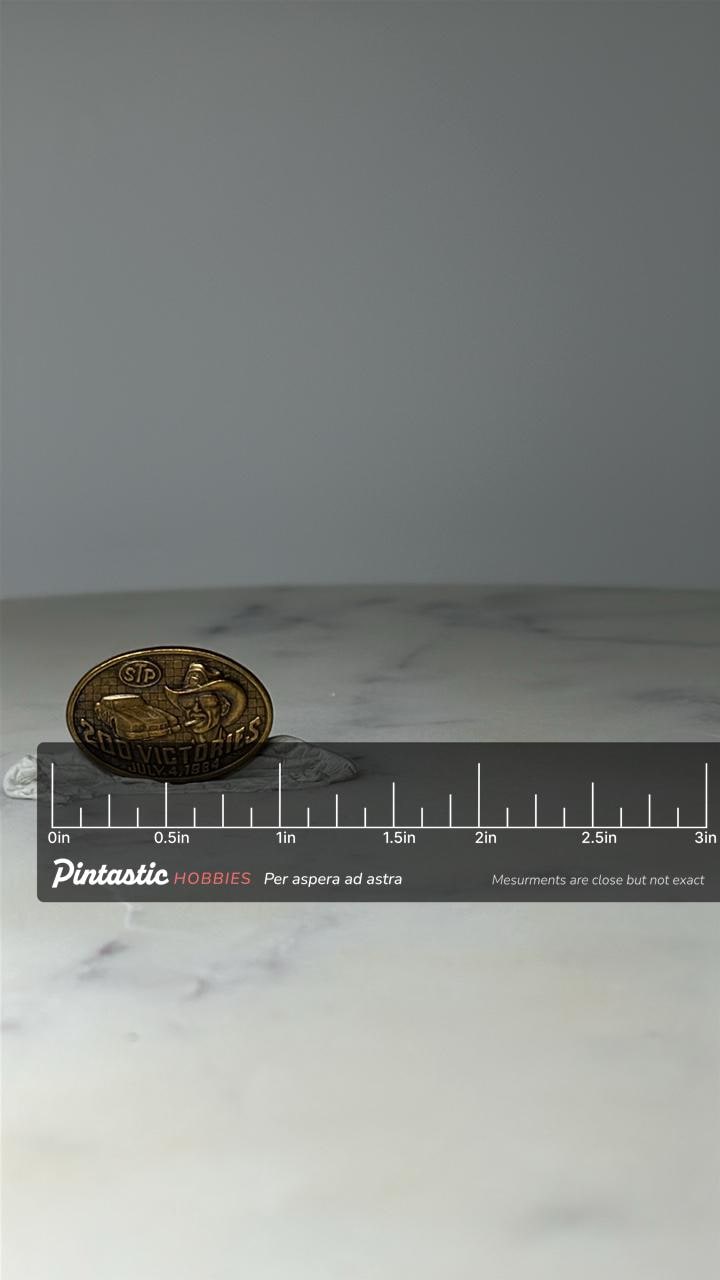 Vintage STP 200 Victories Racing Pin: Gold Tone - 1984 Motorsport Accessory with ruler overlay for size reference