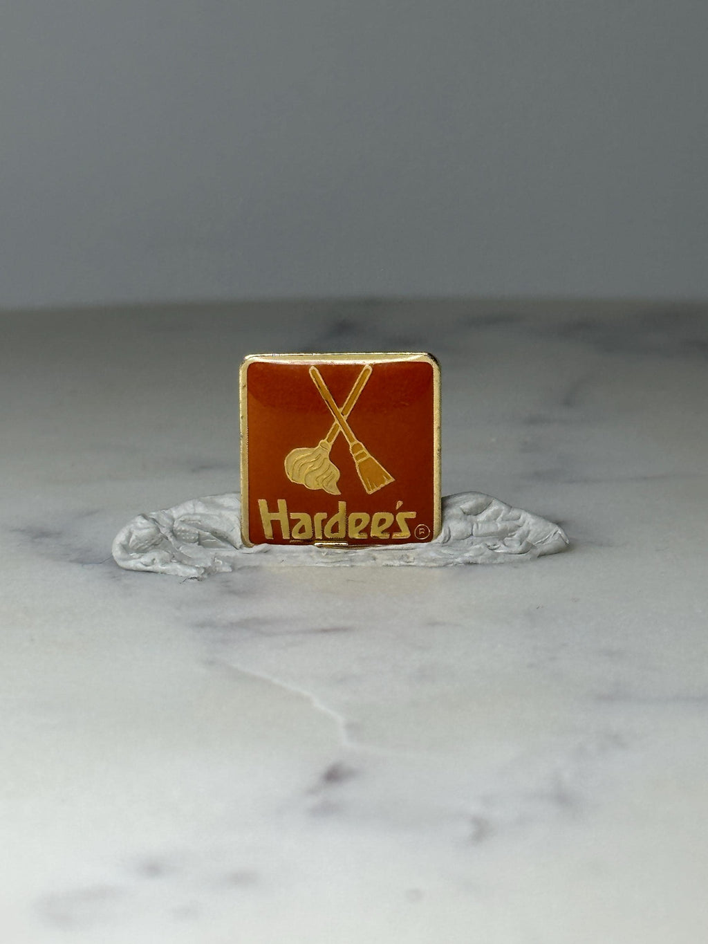 Vintage Hardees Mop and Broom Logo Enamel Pin: Gold Tone Orange - 1980s Fast Food Accessory