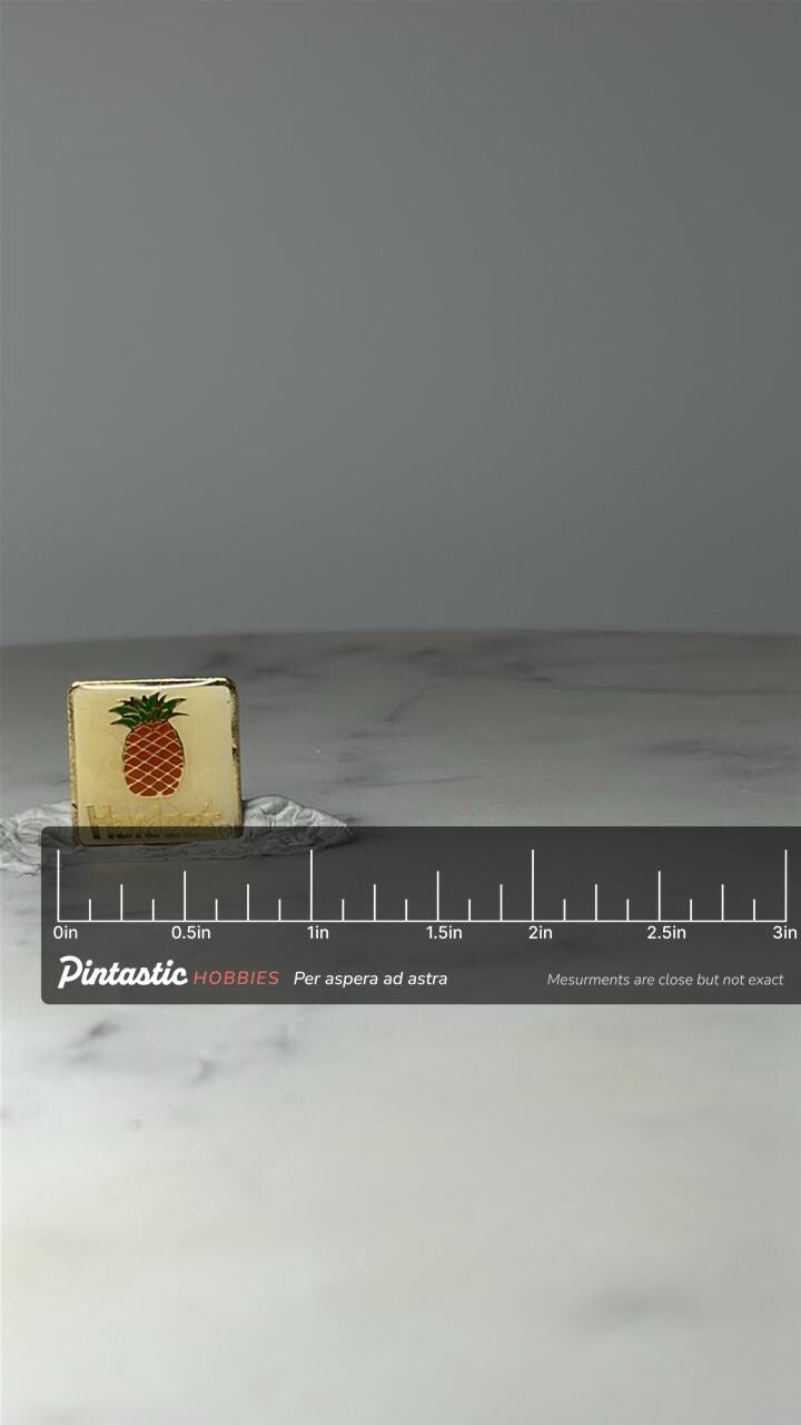 Vintage Hardee’s Pineapple Logo Lapel Pin: Gold Tone - 1970s Accessory with ruler overlay for size reference