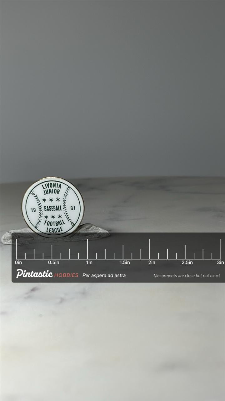 Vintage Livonia Junior Baseball Football Pin: Green Enamel - 1981 Sports Accessory with ruler overlay for size reference