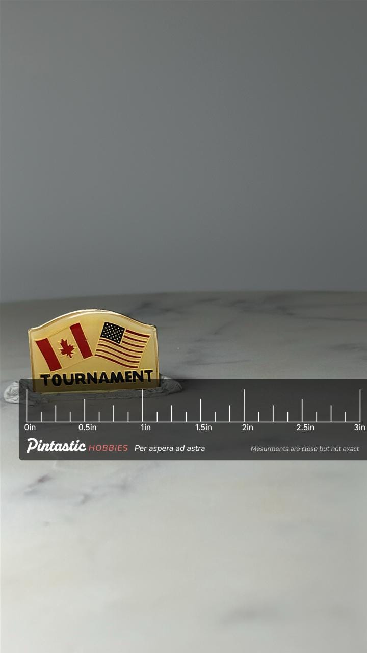 Vintage Canada USA Flags Pin: Gold Tone Enamel - Tournament Accessory with ruler overlay for size reference