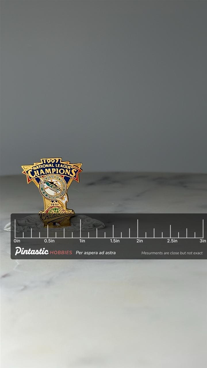 Vintage Florida Marlins Hat Pin: Gold Tone Enamel - 1997 Champs with ruler overlay for size reference