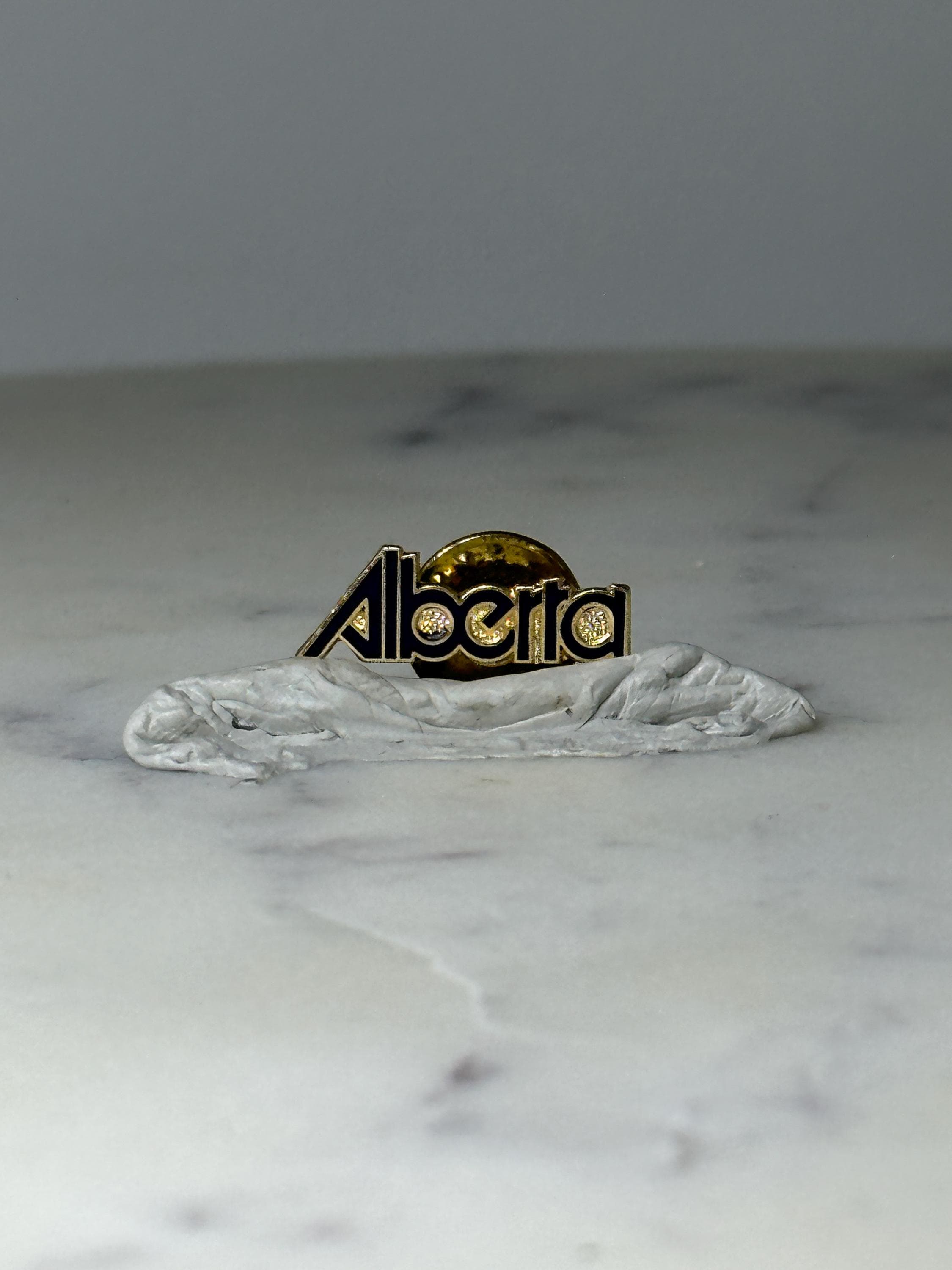 Vintage Alocita Logo Lapel Pin: Gold & Black Enamel - 1980s Corporate Accessory