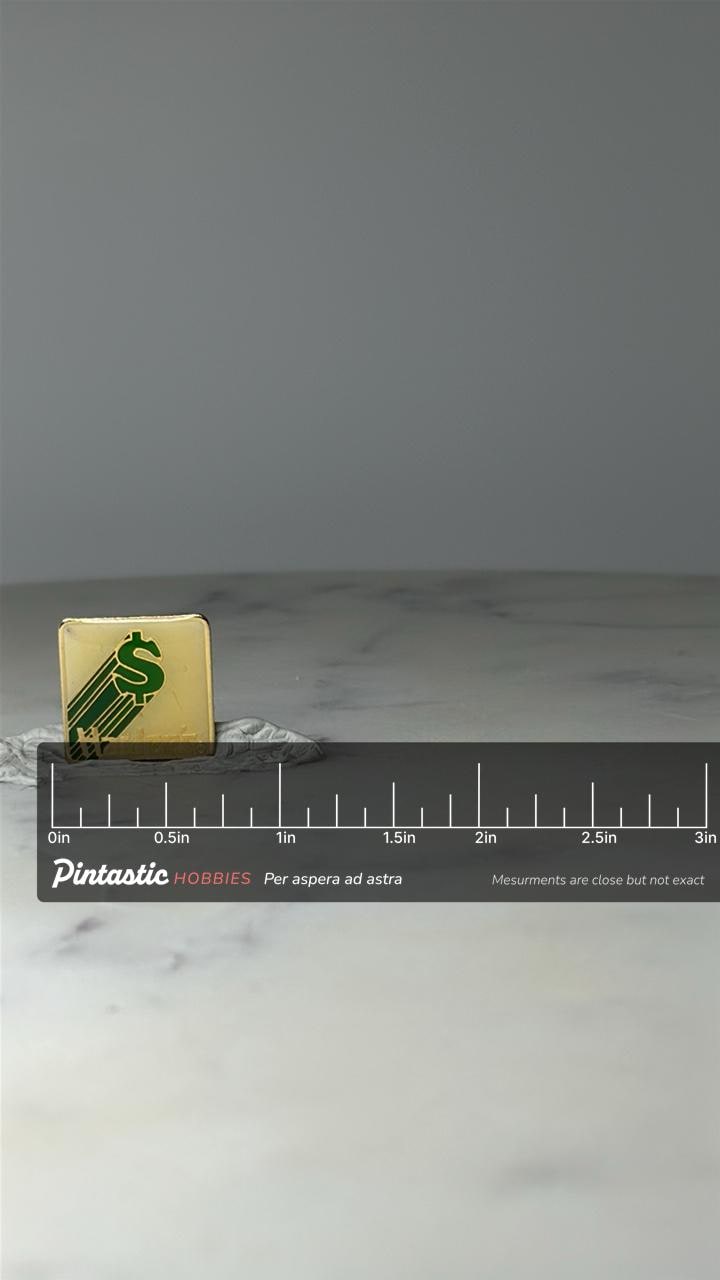 Vintage Hardee’s Dollar Sign Logo Pin: White and Green - Retro Resturant Collectible with ruler overlay for size reference