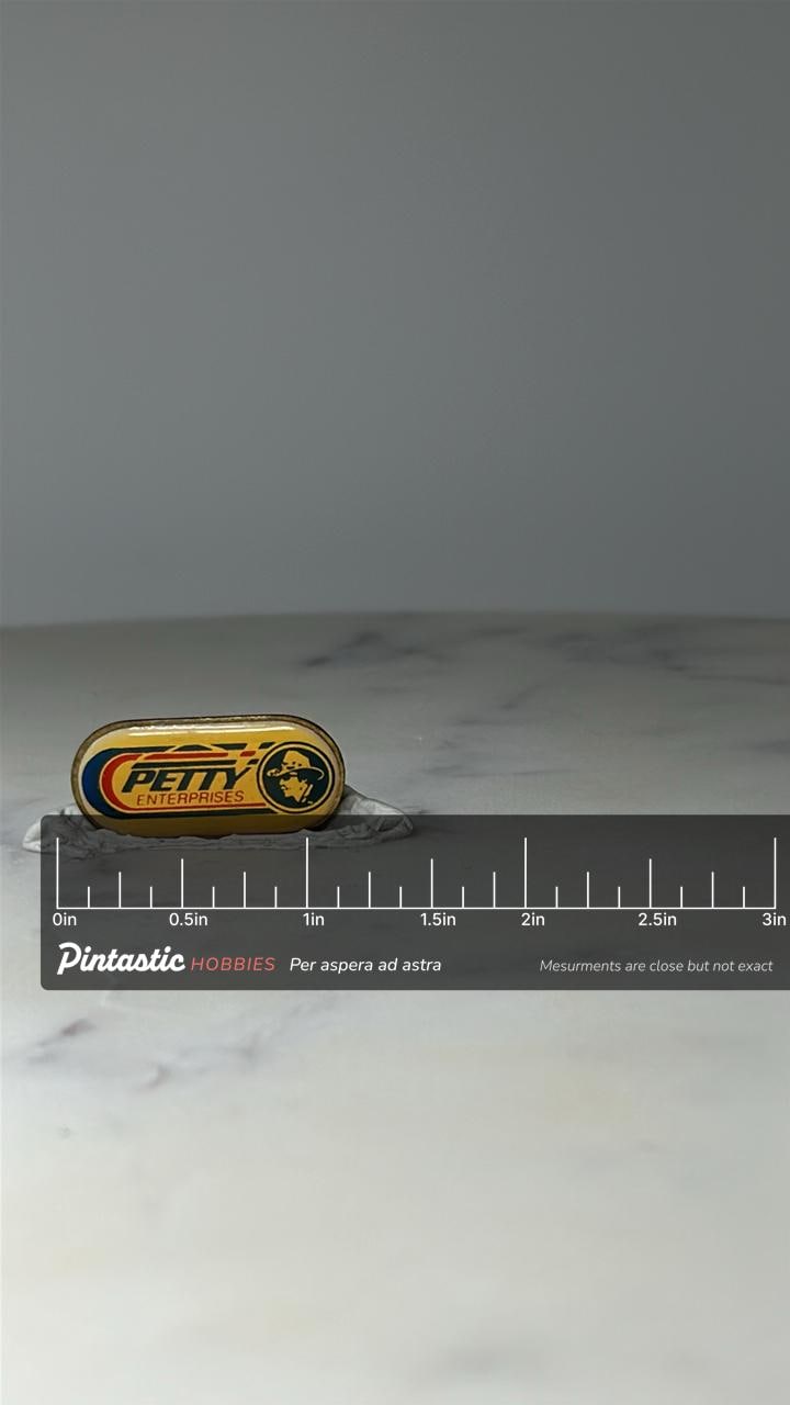 Vintage Petty Enterprises NASCAR Racing Pin: Richard Petty - Retro Racing Collectible with ruler overlay for size reference