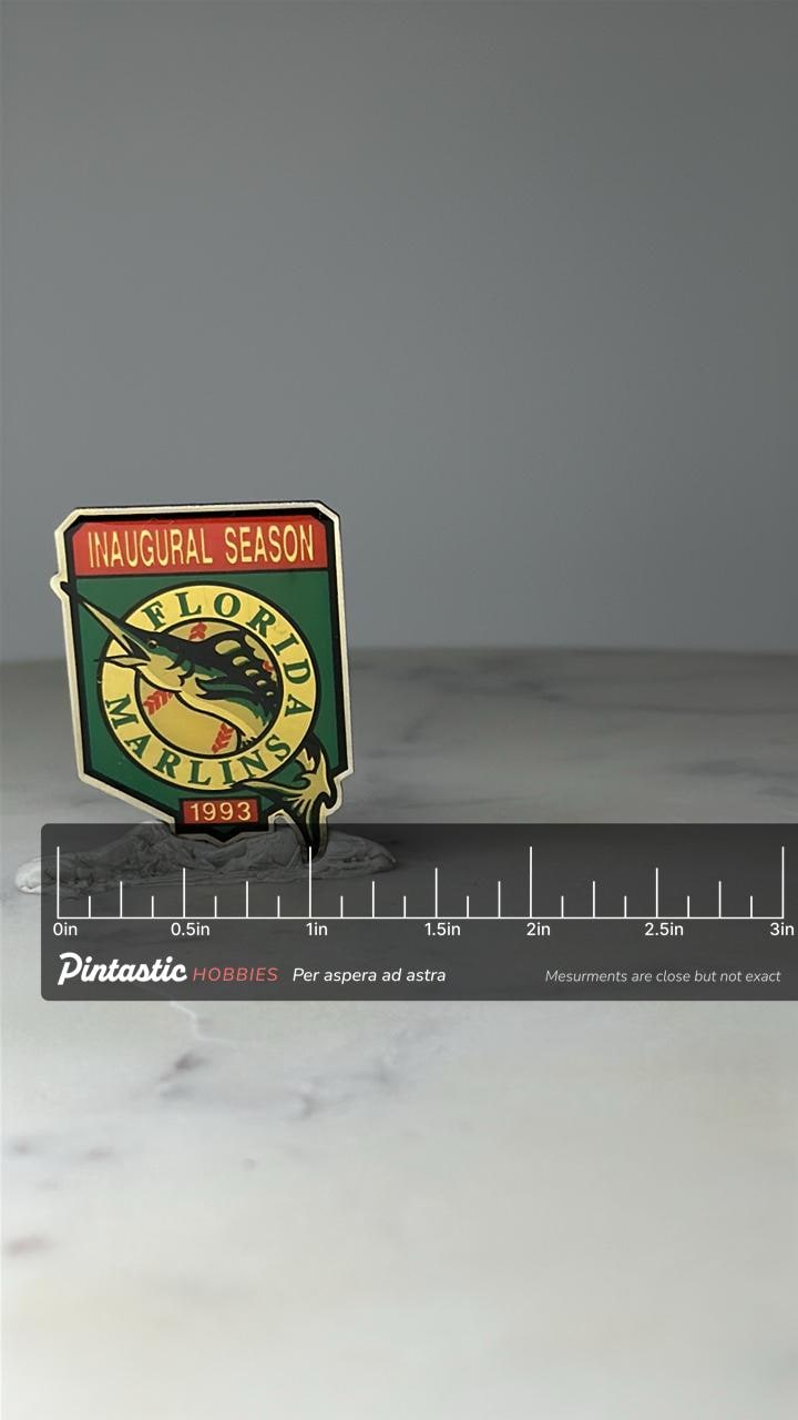 Vintage Florida Marlins Enamel Pin: Gold Tone - 1993 Inaugural Season Accessory with ruler overlay for size reference