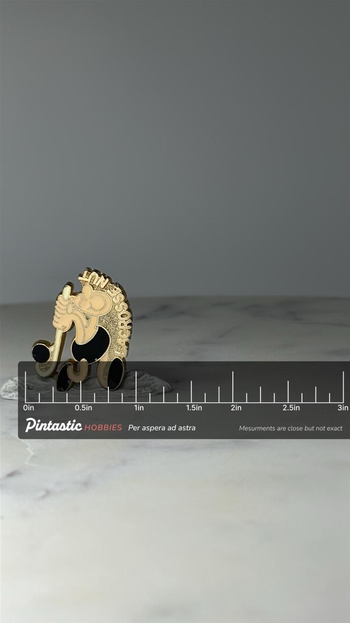 Vintage Lacrosse Nut Cartoon Player Pin: Fun Character - Lacrosse Collectable with ruler overlay for size reference