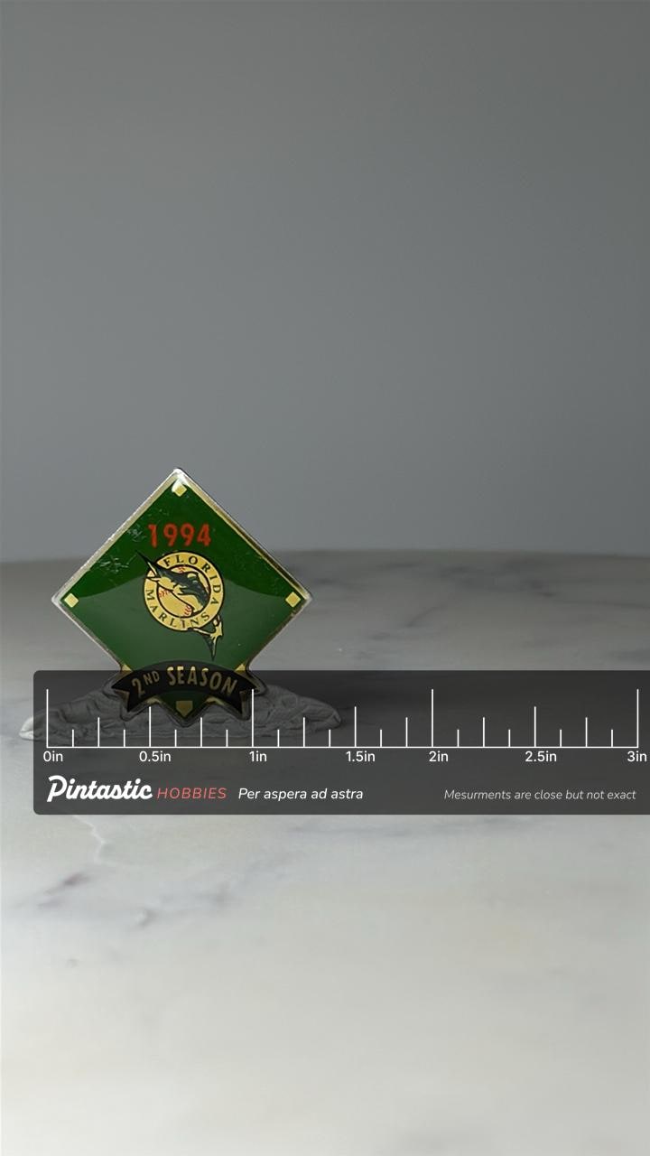 Vintage Florida Marlins Lapel Pin: Green Enamel - 1994 2nd Season Accessory with ruler overlay for size reference