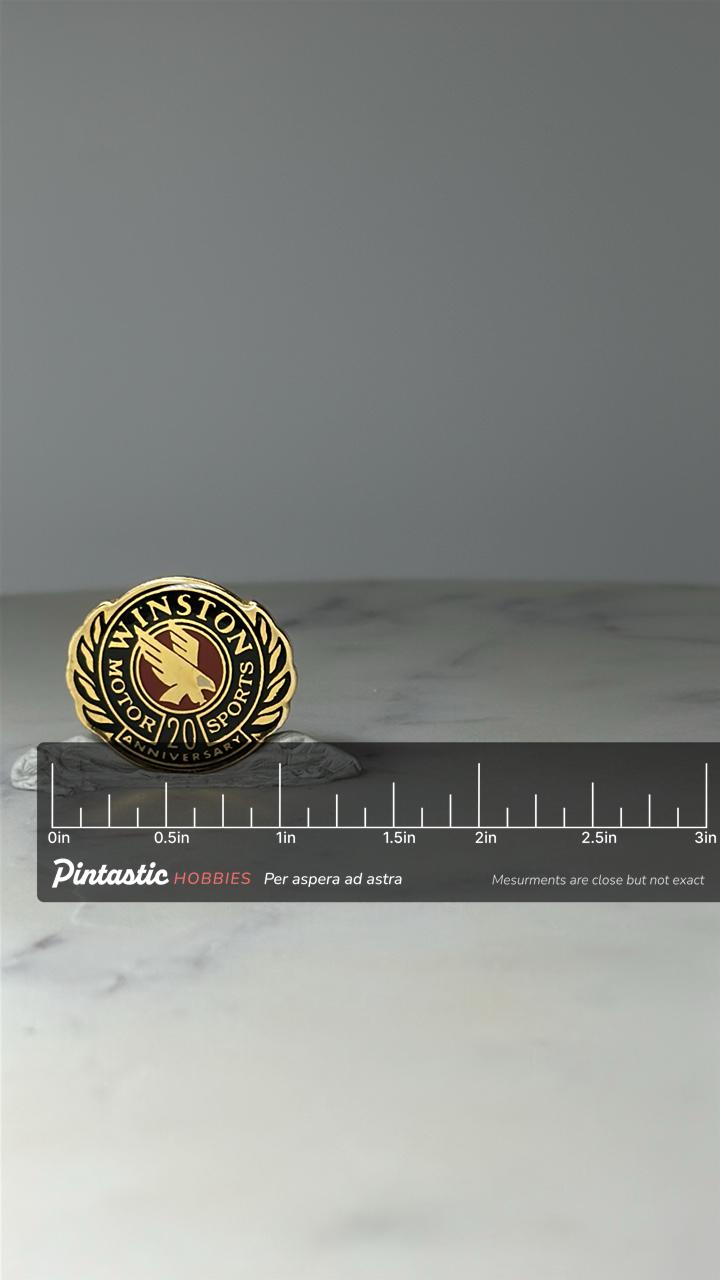 Vintage Winston Motor Sports Pin: Gold Tone Enamel - 20th Anniversary Accessory with ruler overlay for size reference
