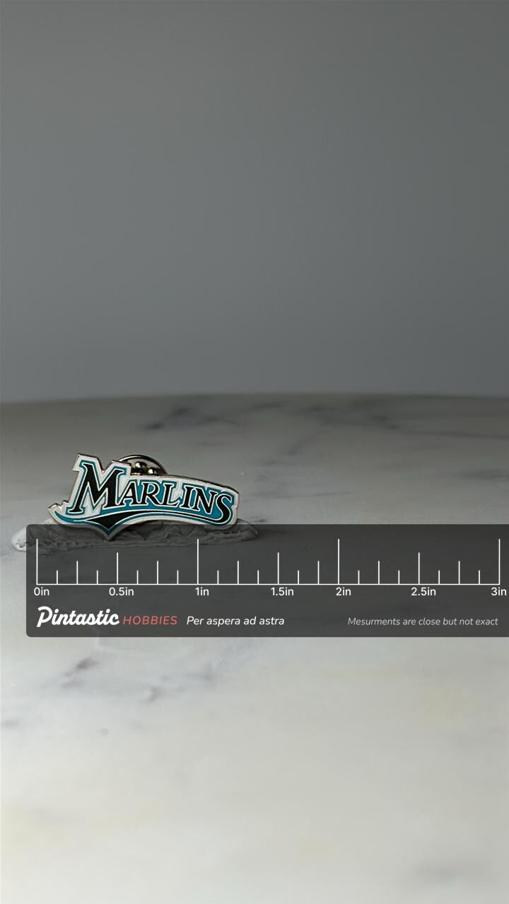 Vintage Florida Marlins Logo Lapel Pin: Teal Enamel - 1990s MLB Accessory with ruler overlay for size reference