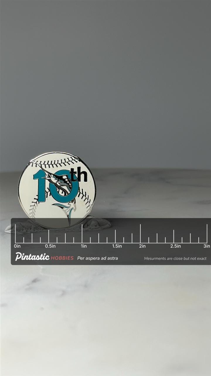 Limited Edition Vintage Florida Marlins 10th Anniversary Pin 70 of 300: Teal Enamel - MLB with ruler overlay for size referen