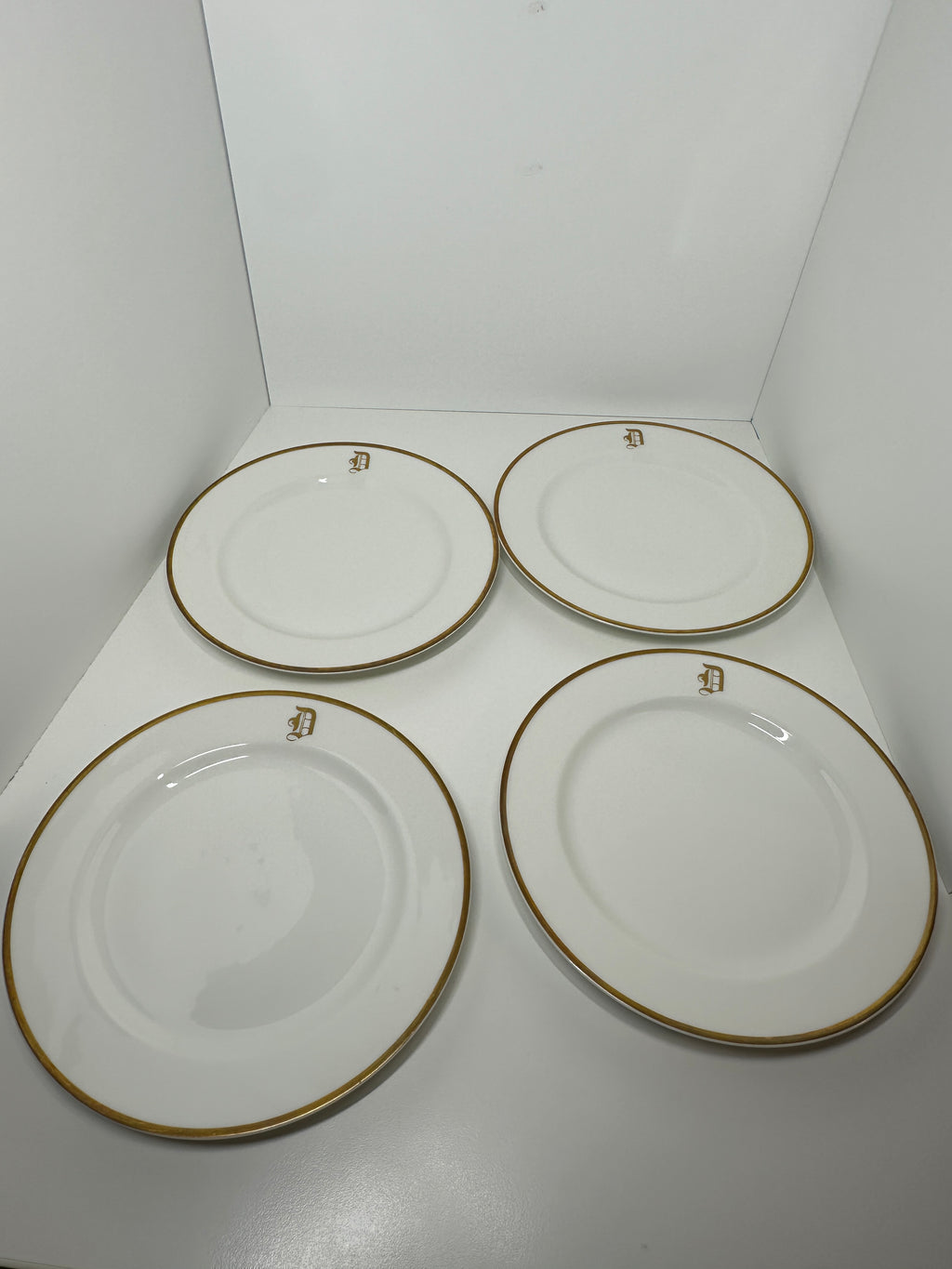 Haviland France monogrammed white dinner plates with gold rim trim