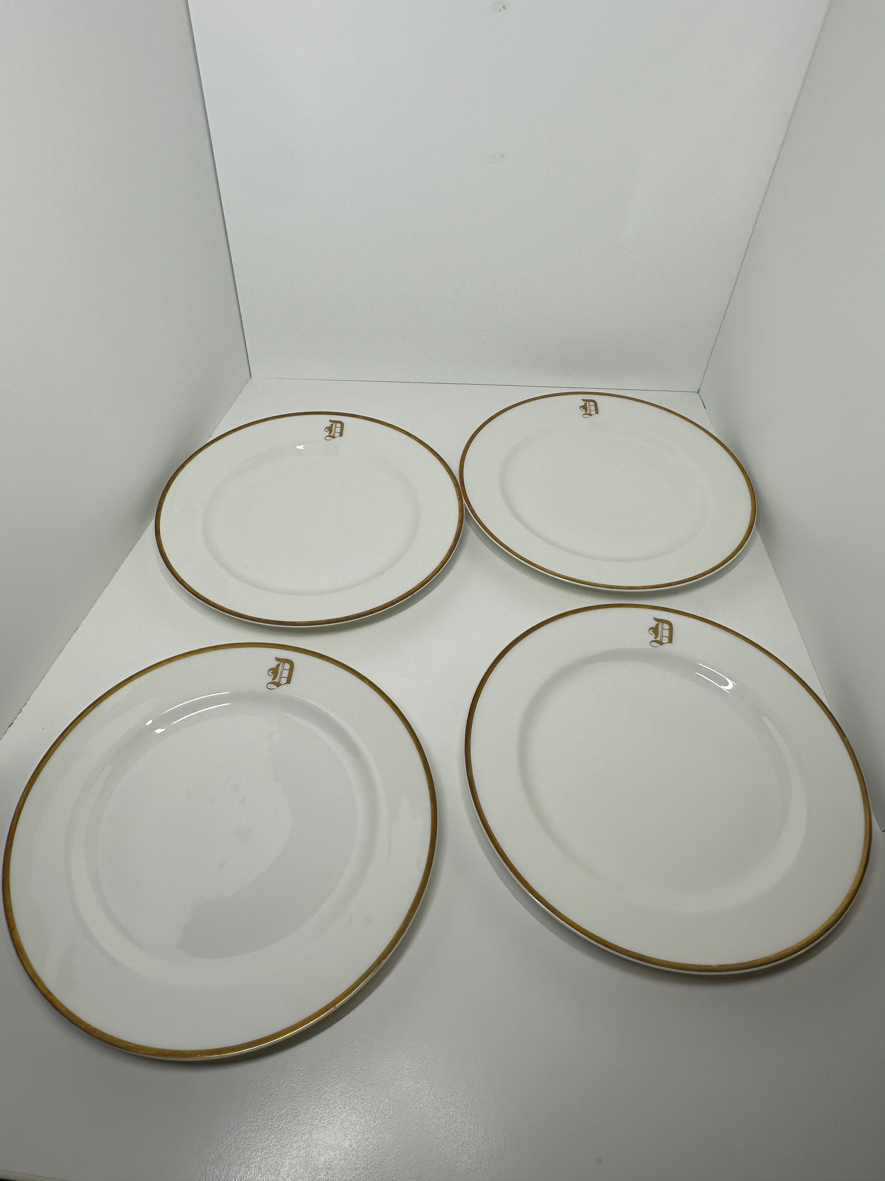Haviland France monogrammed white dinner plates with gold rim trim