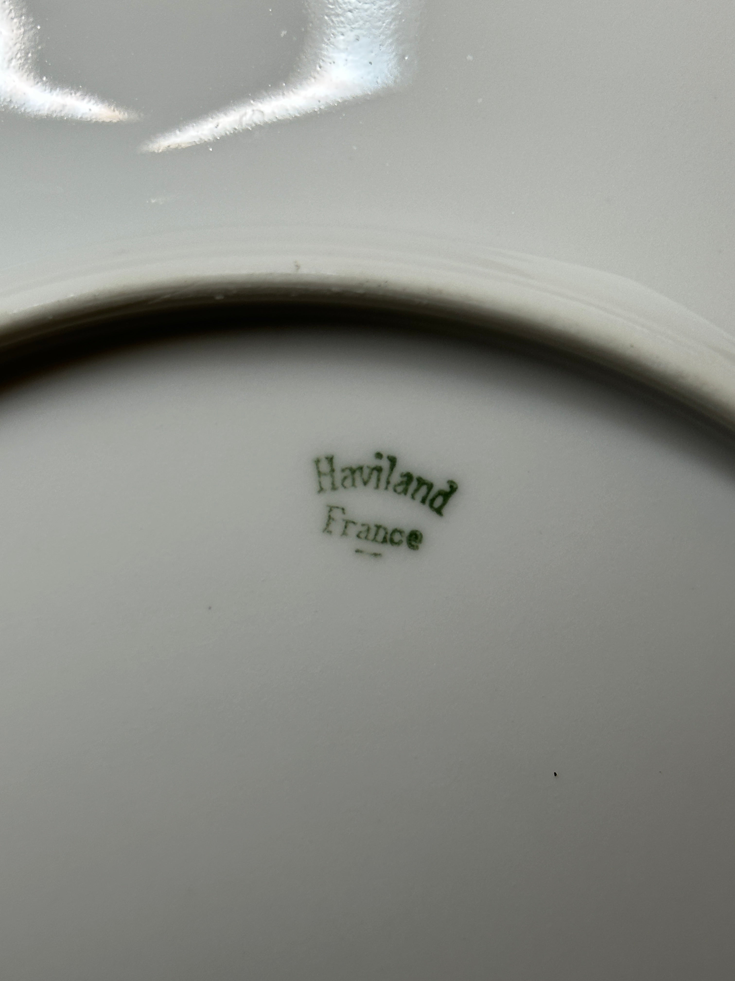Haviland France monogrammed white dinner plates with gold rim trim