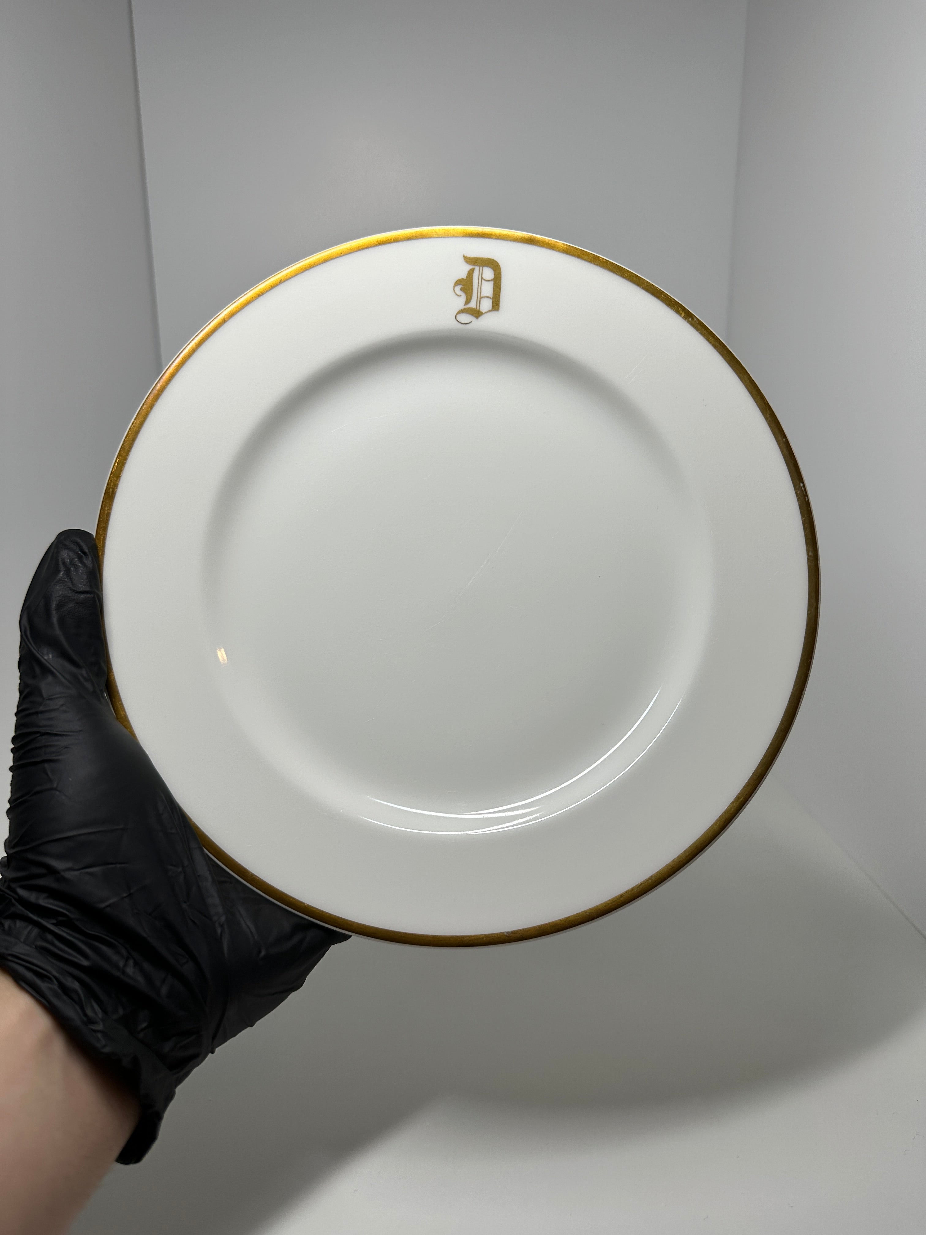 Haviland France monogrammed white dinner plates with gold rim trim