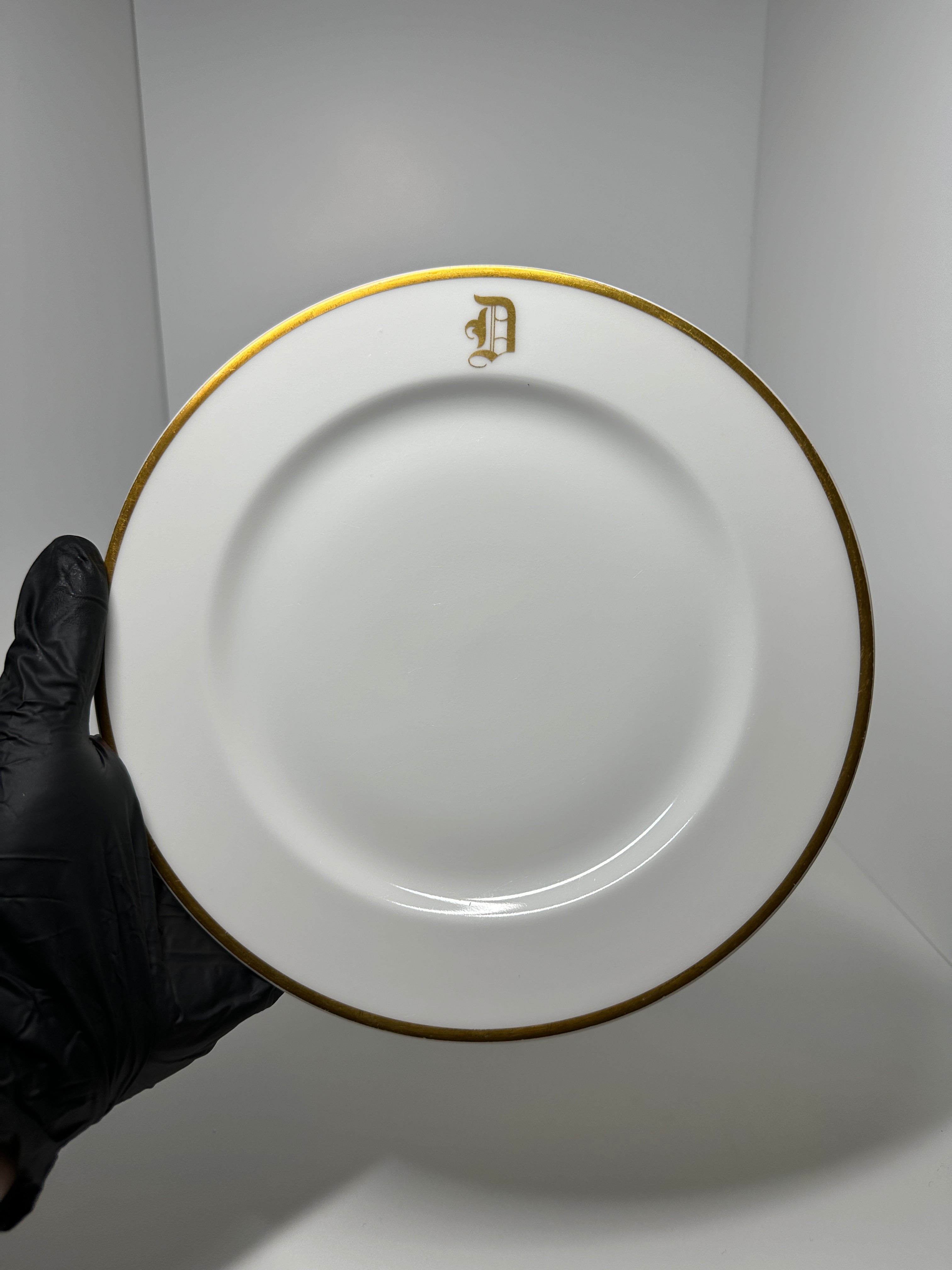 Haviland France monogrammed white dinner plates with gold rim trim