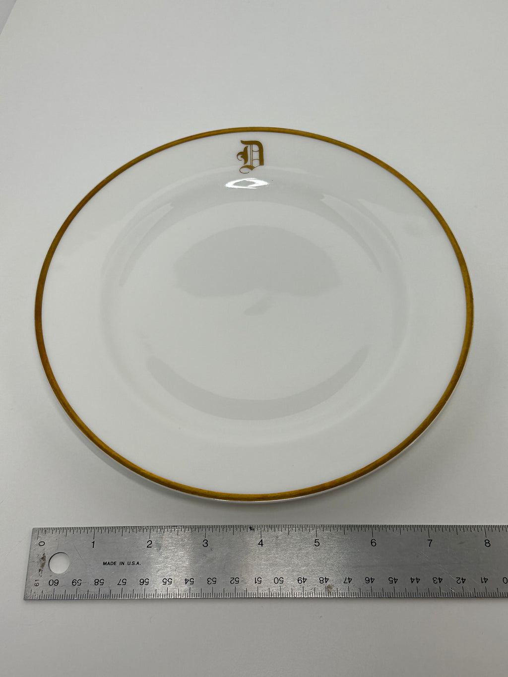 Haviland France monogrammed white dinner plates with gold rim trim