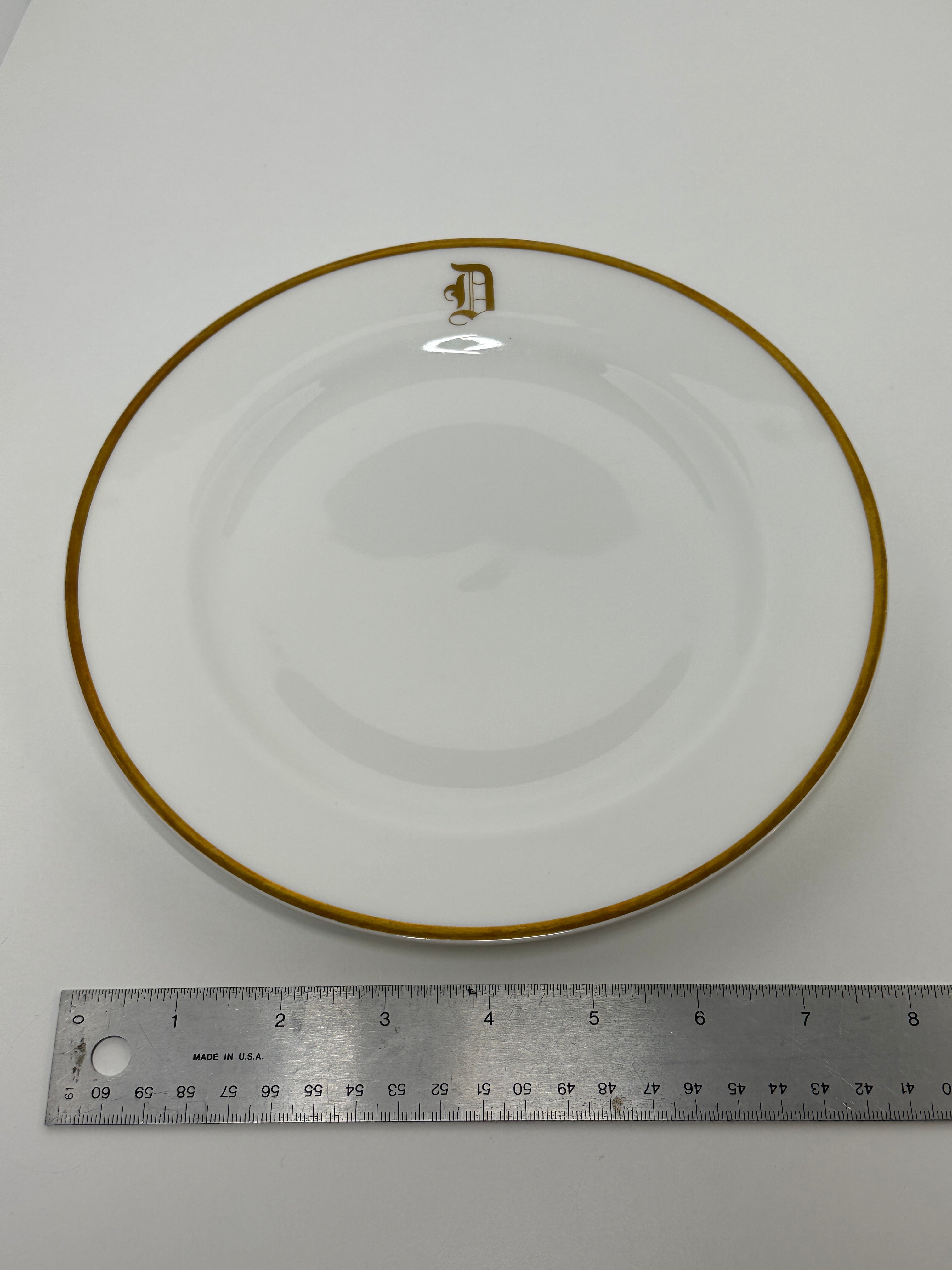 Haviland France monogrammed white dinner plates with gold rim trim