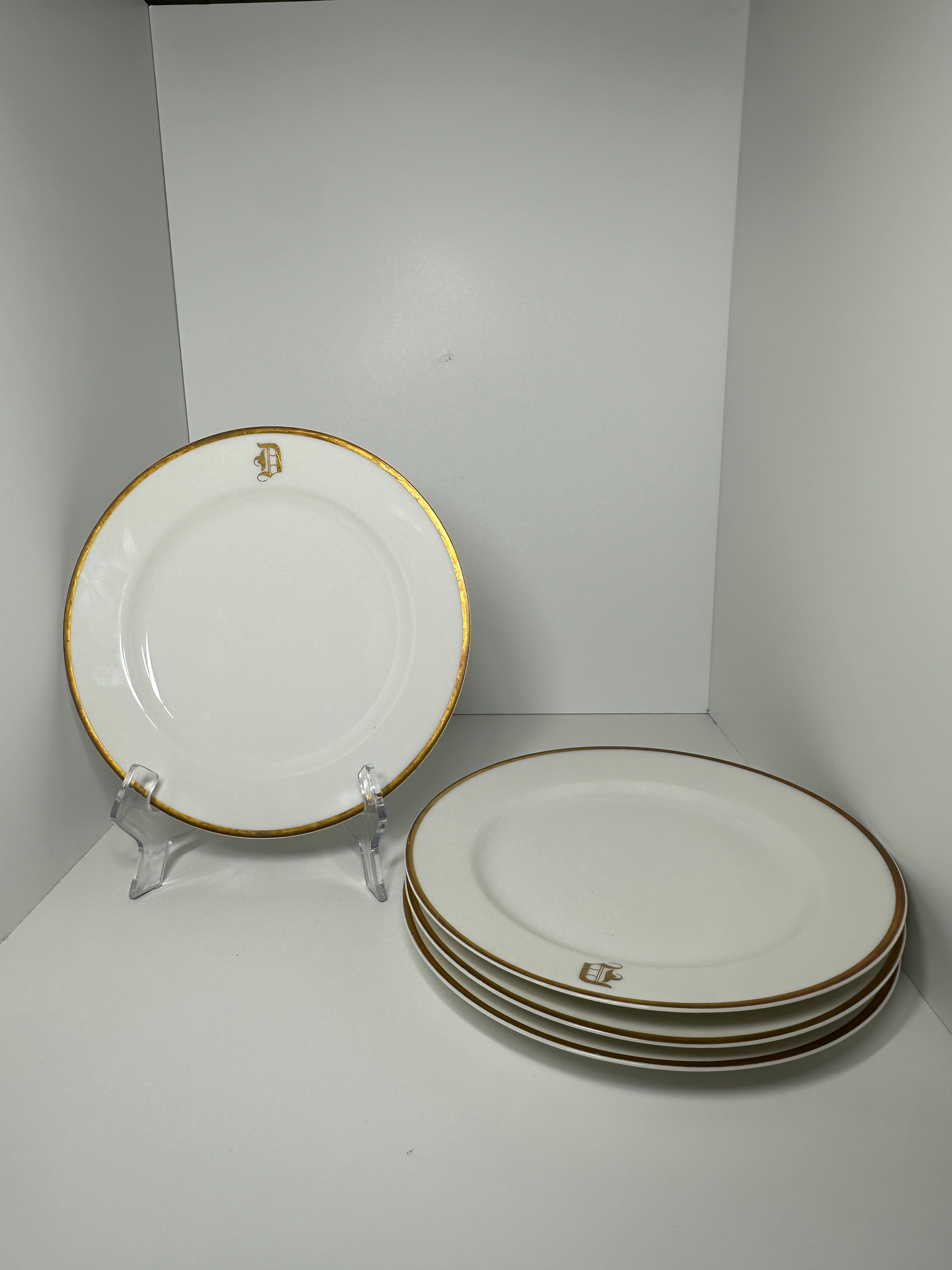 Haviland France monogrammed white dinner plates with gold rim trim