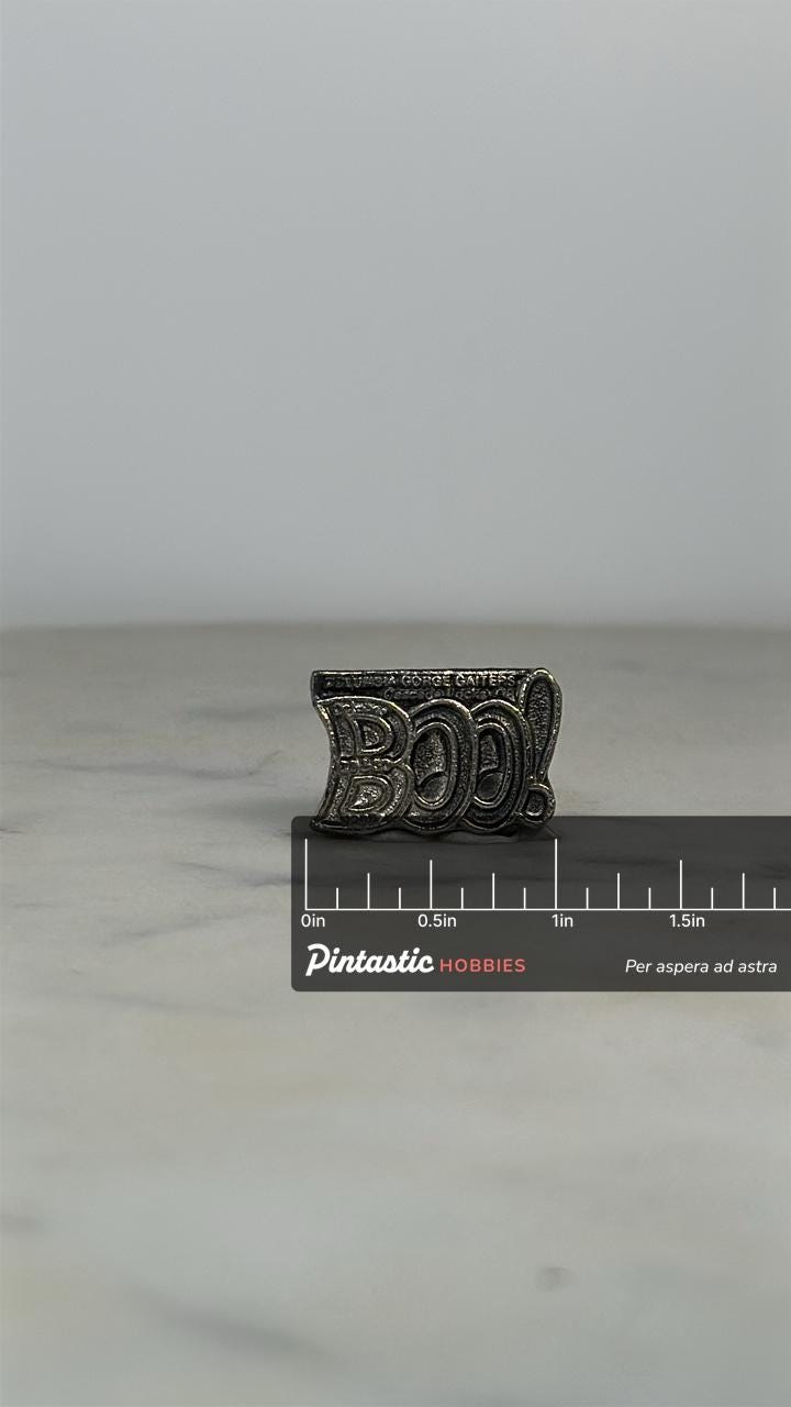 BOO! Halloween Enamel Pin: Silver Tone - Spooky Event Accessory with ruler overlay for size reference