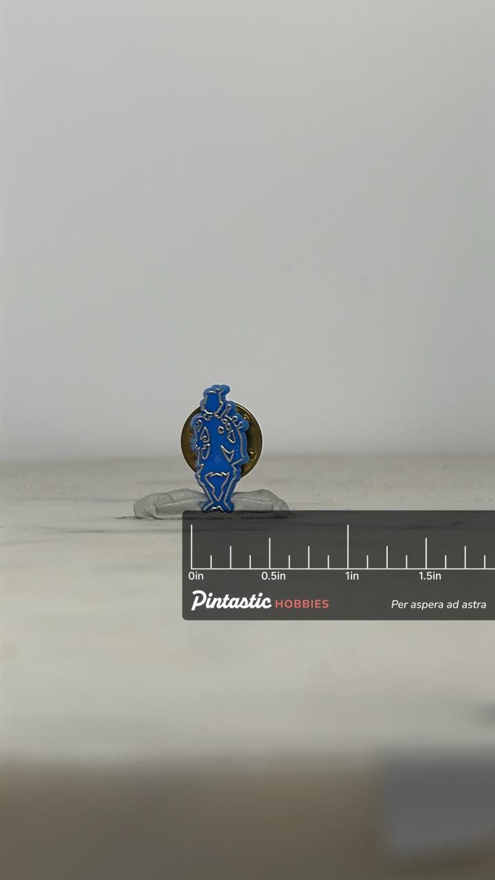 Bagpiper Pin: Blue Enamel Silhouette – Vintage Scottish Heritage Lapel with ruler overlay for size reference
