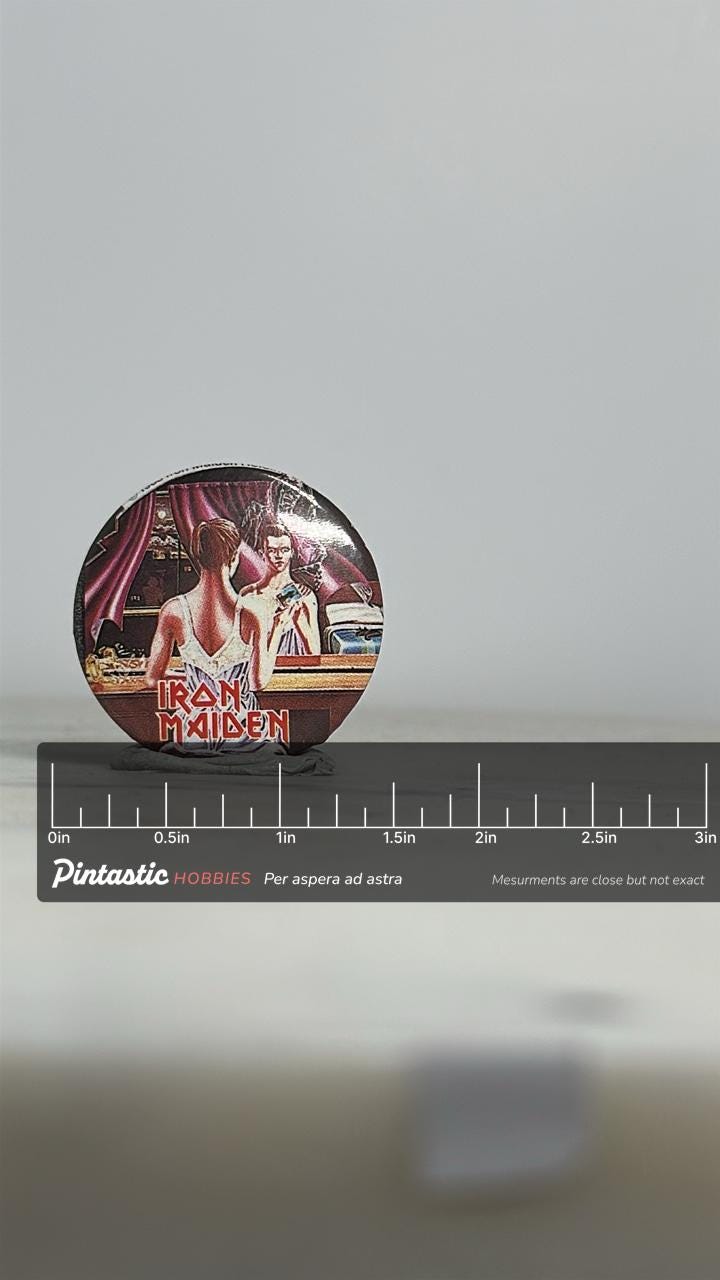 Iron Maiden Collectible Pin: Full-Color Album Art - Vintage Rock Accessory with ruler overlay for size reference