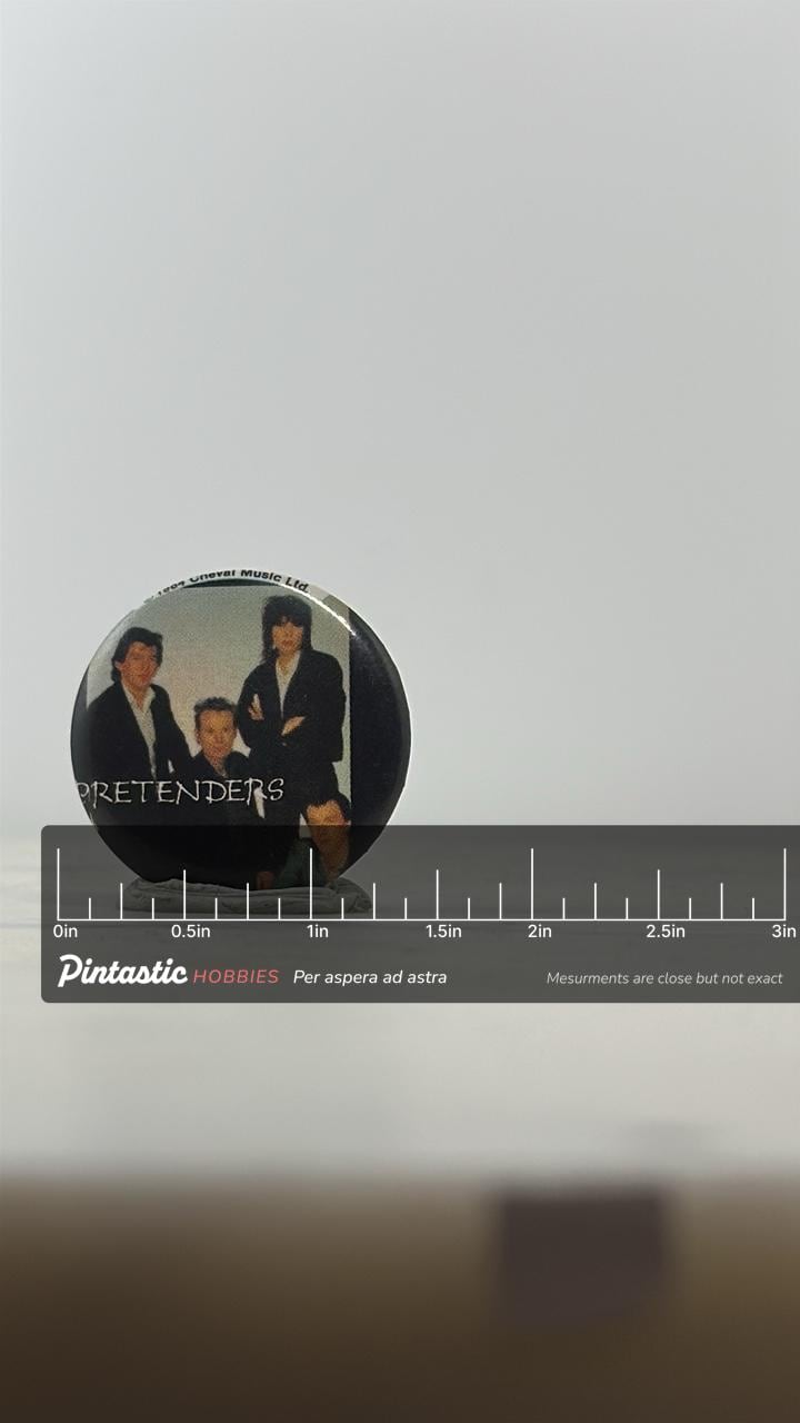 Pretenders Band Button Pin: Glossy Finish - 1980s Rock Accessory with ruler overlay for size reference