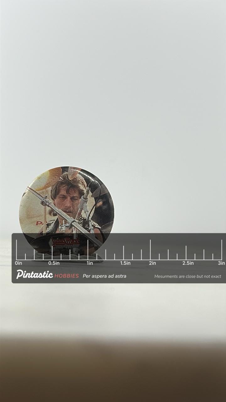 Judas Priest Band Pin: Round Photo Button - 1980s Rock Accessory with ruler overlay for size reference