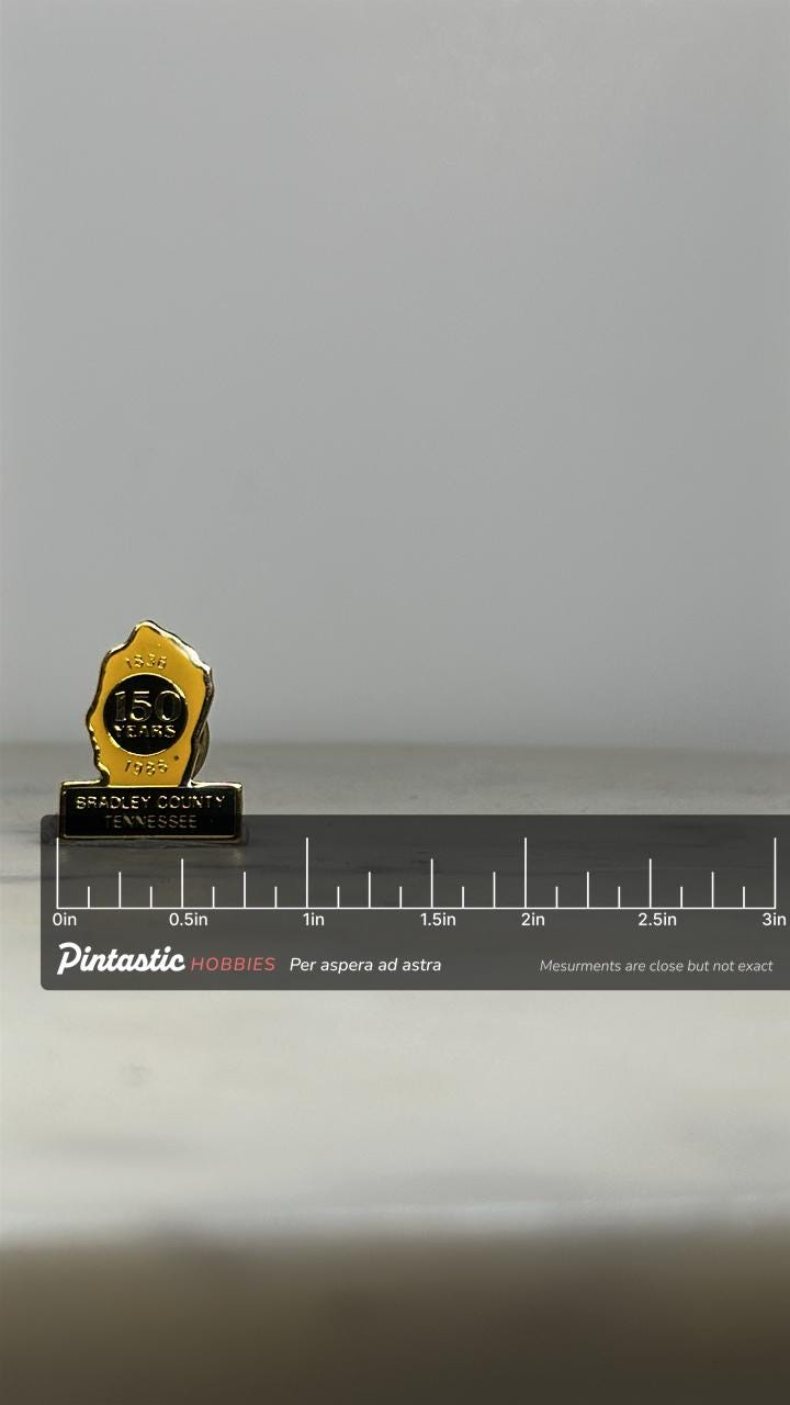 Bradley County Tennessee Pin: Yellow Enamel Gold Tone - 1986 Anniversary Accessory with ruler overlay for size reference