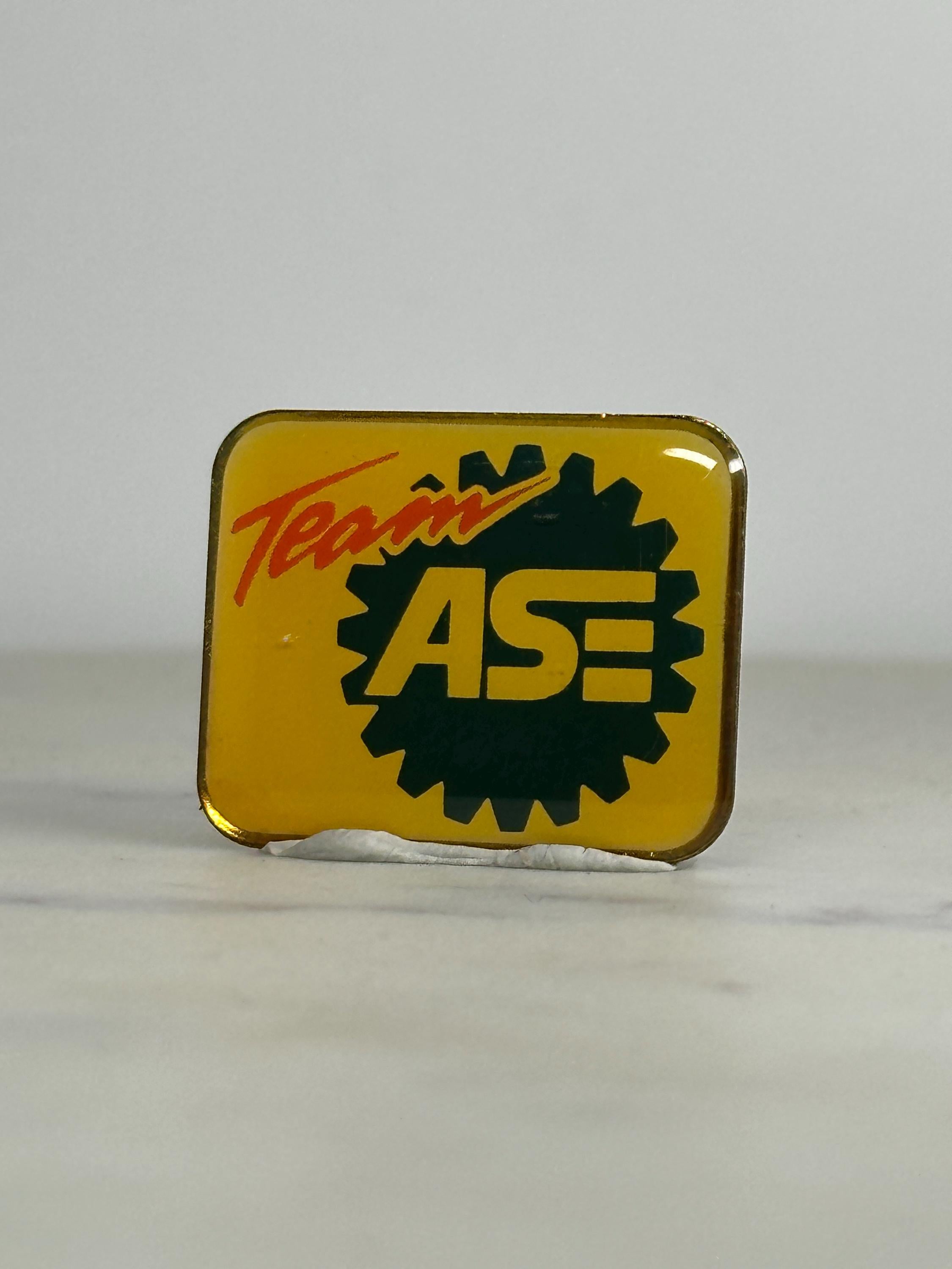 Team ASE Enamel Pin: Yellow Gear Logo - Retro Auto Accessory