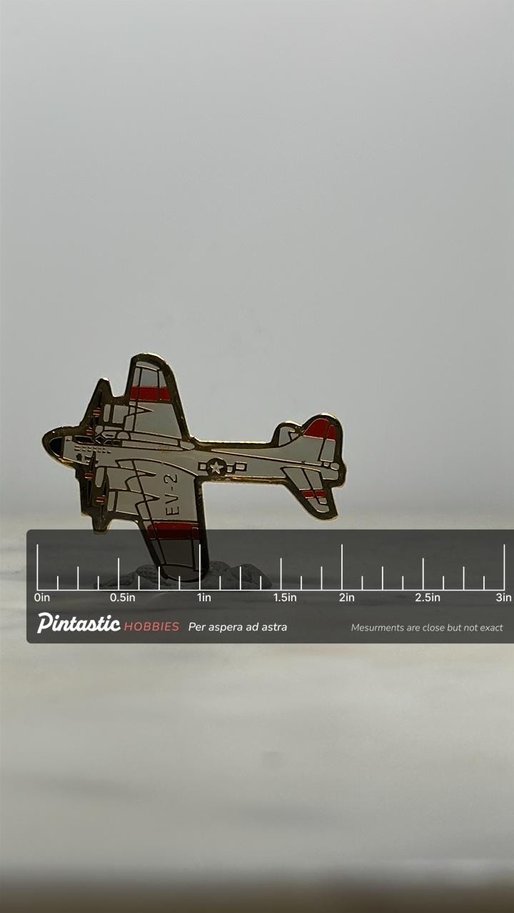 E-2 Hawkeye Navy Aircraft Pin: Gray & Red Enamel – U.S. Navy Airborne Early Warning Plane with ruler overlay for size referen