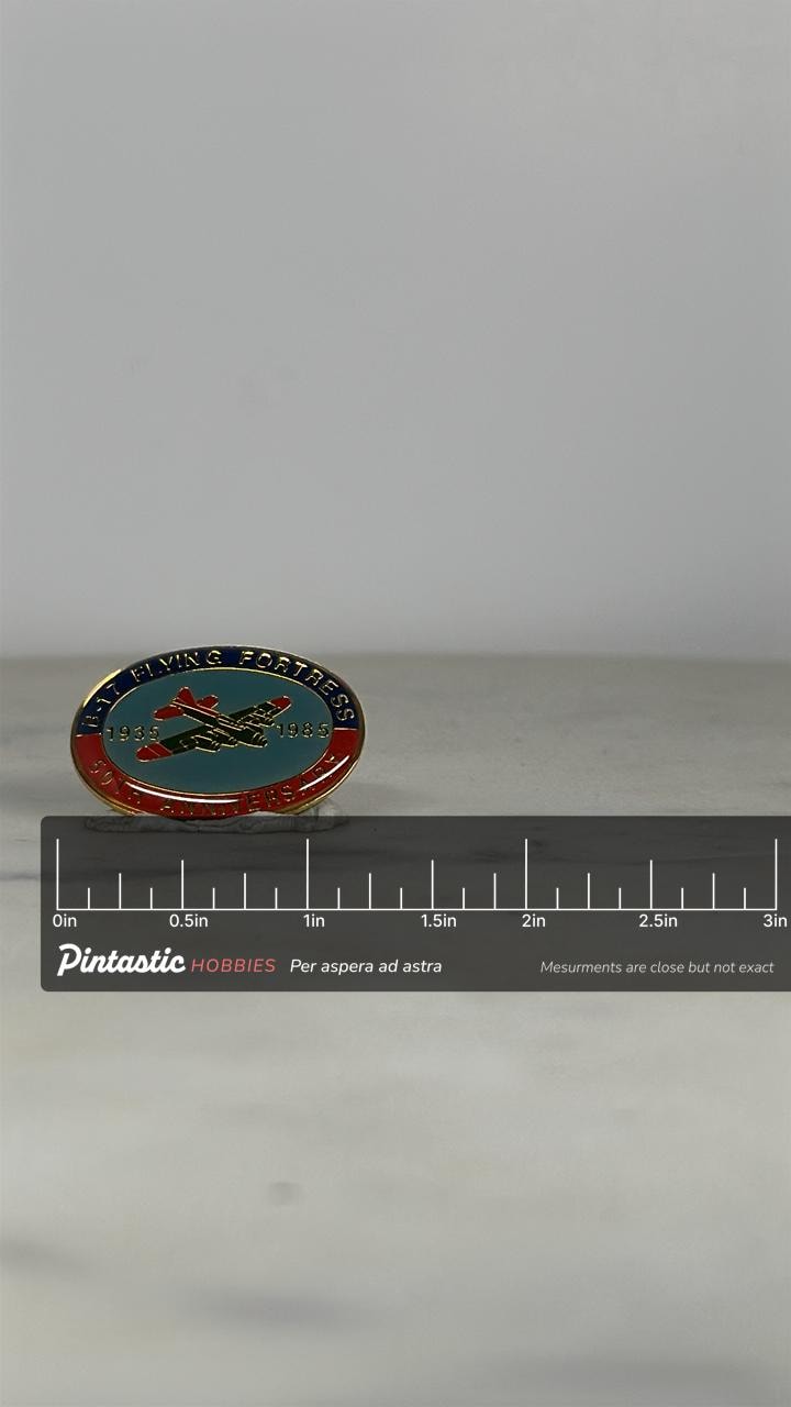 B-17 Flying Fortress Enamel Pin: Red/Blue Oval - 1985 Anniversary Accessory with ruler overlay for size reference