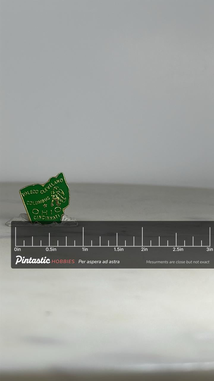 Ohio State Shaped Enamel Pin: Green Gold Finish - Vintage Travel Accessory with ruler overlay for size reference