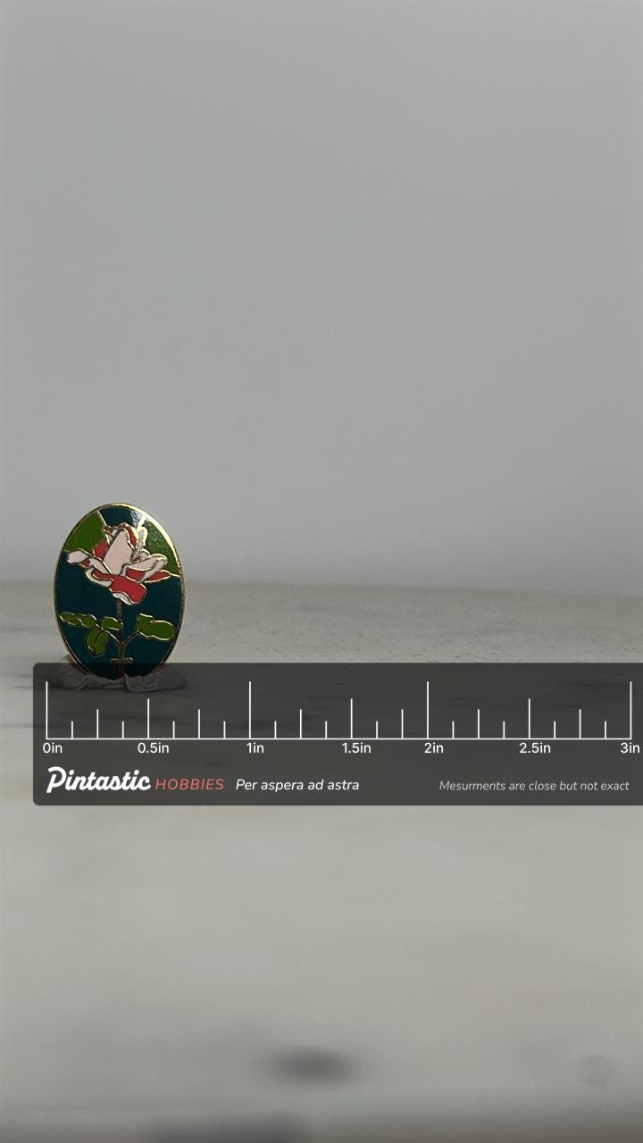 Rose Flower Enamel Pin: Oval Stained Glass Look - Vintage Floral Accessory with ruler overlay for size reference