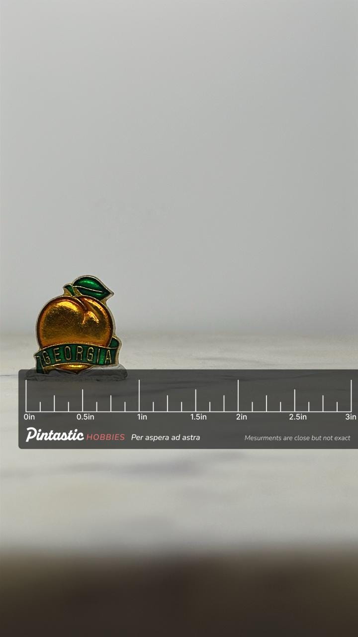Georgia Peach Enamel Pin: Gold & Green Finish - Vintage State Souvenir with ruler overlay for size reference