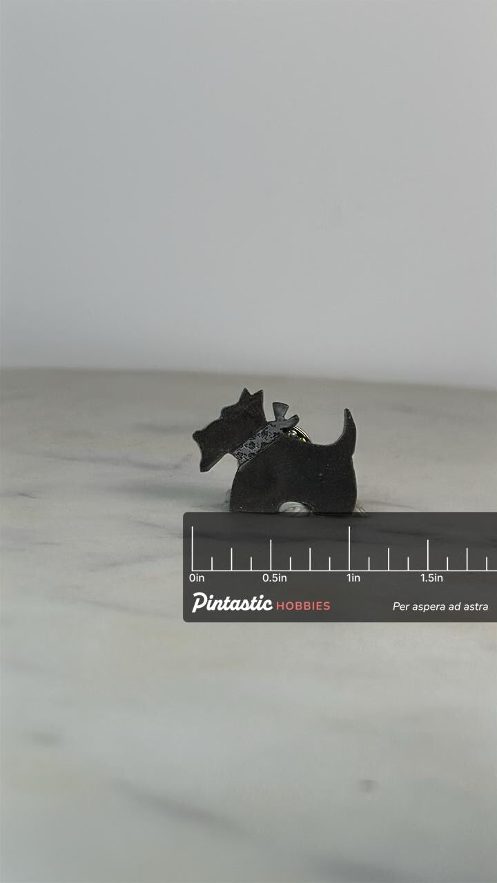 Scottie Dog Enamel Pin: Matte Black Finish - Retro Animal Accessory with ruler overlay for size reference