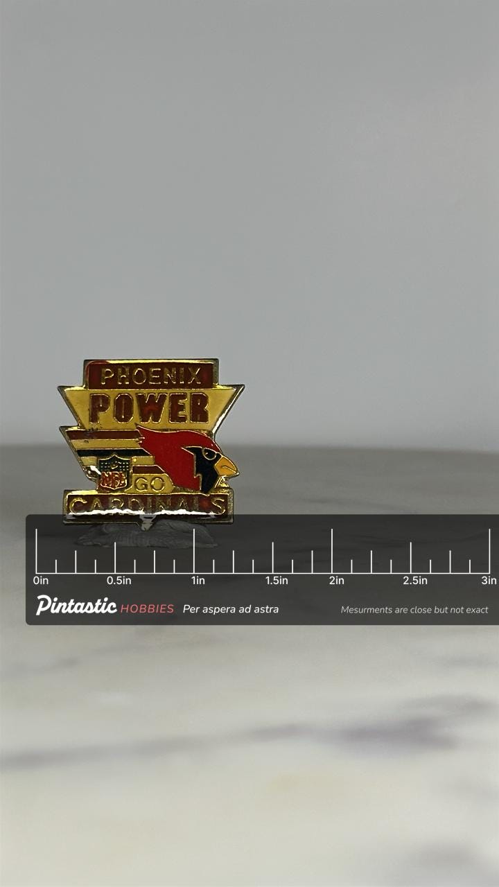 Phoenix Cardinals NFL Pin: Red & Gold Enamel - Vintage Sports Accessory with ruler overlay for size reference