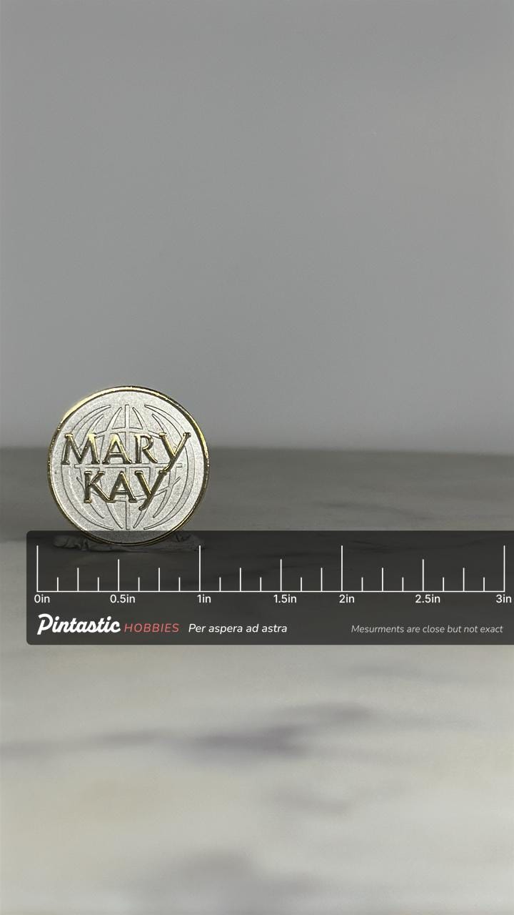 Mary Kay Company Pin: Silver Tone Round - Vintage Corporate Accessory with ruler overlay for size reference