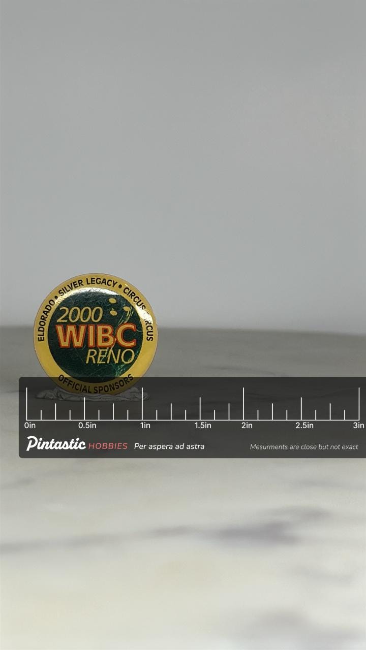 WIBC Reno Enamel Pin: Green & Yellow Finish - 2000 Sports Accessory with ruler overlay for size reference