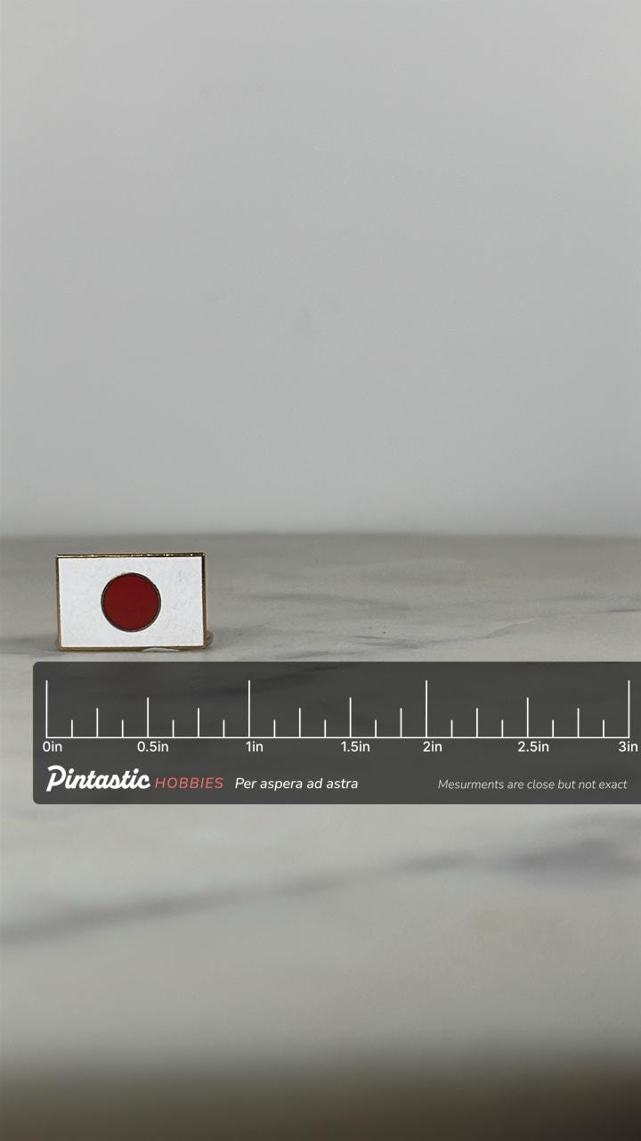 Japan Flag Enamel Pin: Red & White Gloss - Vintage Travel Accessory with ruler overlay for size reference