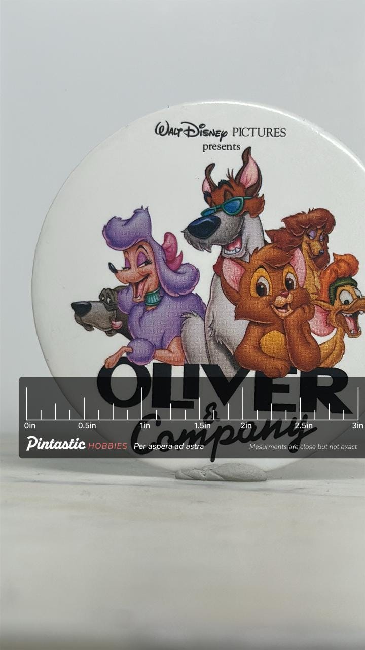 Oliver & Company Button Pin: Glossy White Finish - 1980s Disney Accessory with ruler overlay for size reference