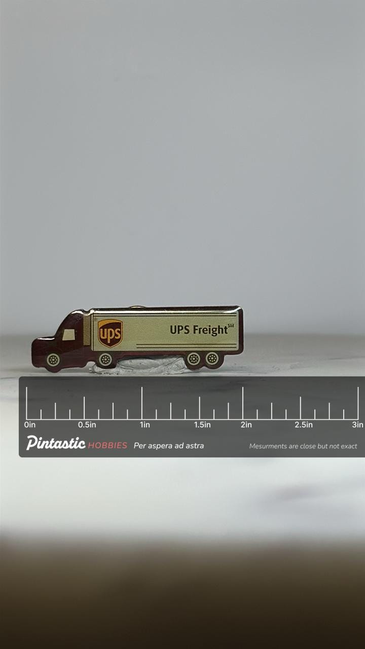UPS Freight Truck Pin: Gold & Brown Enamel - Vintage Company Accessory with ruler overlay for size reference