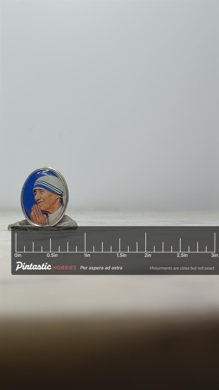Mother Teresa Portrait Pin: Oval Silvertone - Faith-Inspired Accessory with ruler overlay for size reference